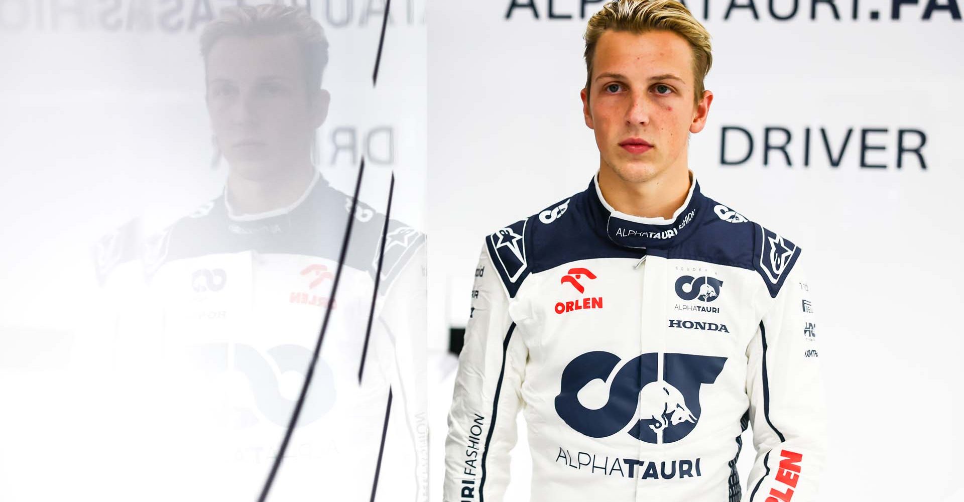 ZANDVOORT, NETHERLANDS - AUGUST 25: Liam Lawson of New Zealand and Scuderia AlphaTauri looks on in the garage after practice ahead of the F1 Grand Prix of The Netherlands at Circuit Zandvoort on August 25, 2023 in Zandvoort, Netherlands. (Photo by Mark Thompson/Getty Images)