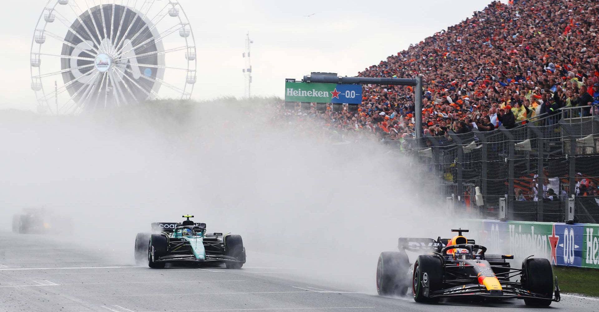 ZANDVOORT, NETHERLANDS - AUGUST 27: Max Verstappen of the Netherlands driving the (1) Oracle Red Bull Racing RB19 leads Fernando Alonso of Spain driving the (14) Aston Martin AMR23 Mercedes during the F1 Grand Prix of The Netherlands at Circuit Zandvoort on August 27, 2023 in Zandvoort, Netherlands. (Photo by Peter Fox/Getty Images) // Getty Images / Red Bull Content Pool // SI202308270971 // Usage for editorial use only //