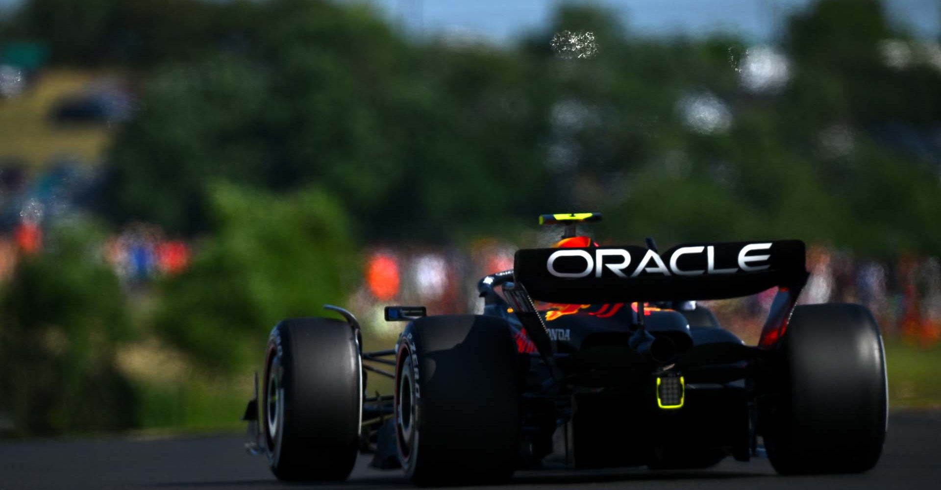 BUDAPEST, HUNGARY - JULY 22: Sergio Perez of Mexico driving the (11) Oracle Red Bull Racing RB19 on track during qualifying ahead of the F1 Grand Prix of Hungary at Hungaroring on July 22, 2023 in Budapest, Hungary. (Photo by Dan Mullan/Getty Images)