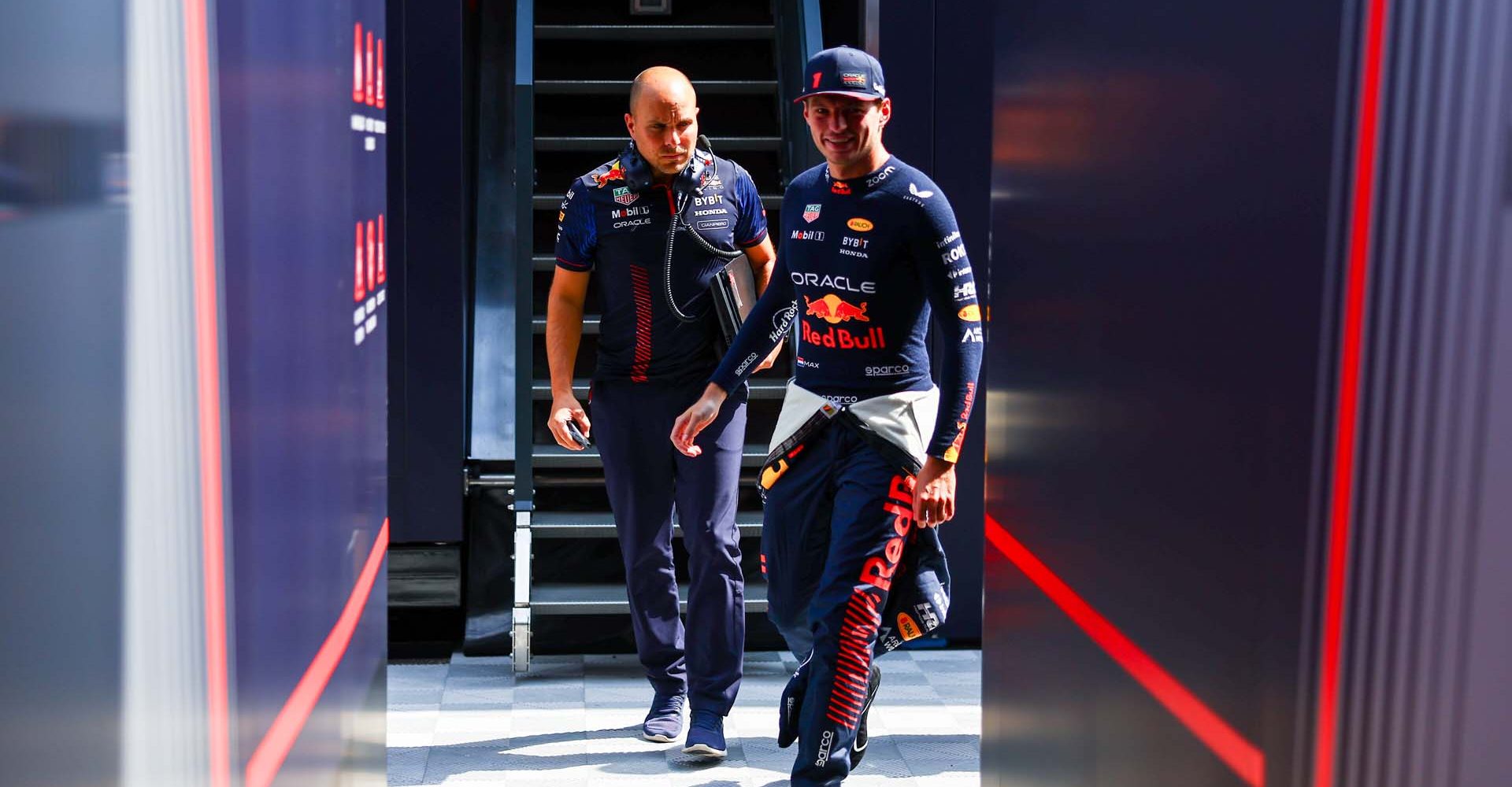 MONZA, ITALY - SEPTEMBER 01: Max Verstappen of the Netherlands and Oracle Red Bull Racing and race engineer Gianpiero Lambiase walk in the garageq during practice ahead of the F1 Grand Prix of Italy at Autodromo Nazionale Monza on September 01, 2023 in Monza, Italy. (Photo by Mark Thompson/Getty Images) // Getty Images / Red Bull Content Pool // SI202309010346 // Usage for editorial use only //