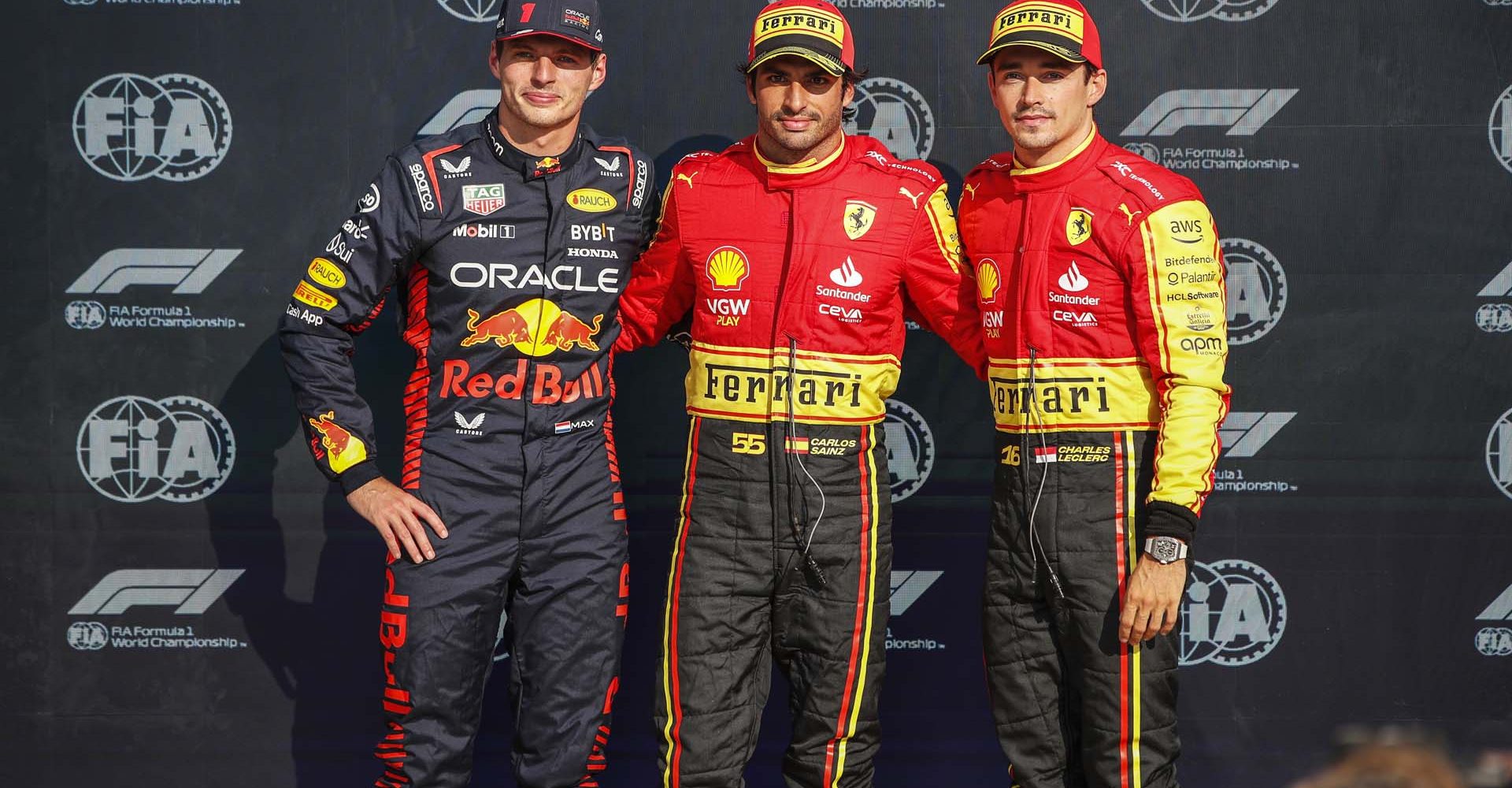 AUTODROMO NAZIONALE MONZA, ITALY - SEPTEMBER 02: Top three qualifiers Max Verstappen, Red Bull Racing, pole man Carlos Sainz, Scuderia Ferrari, and Charles Leclerc, Scuderia Ferrari during the Italian GP at Autodromo Nazionale Monza on Saturday September 02, 2023 in Monza, Italy. (Photo by Zak Mauger / LAT Images)