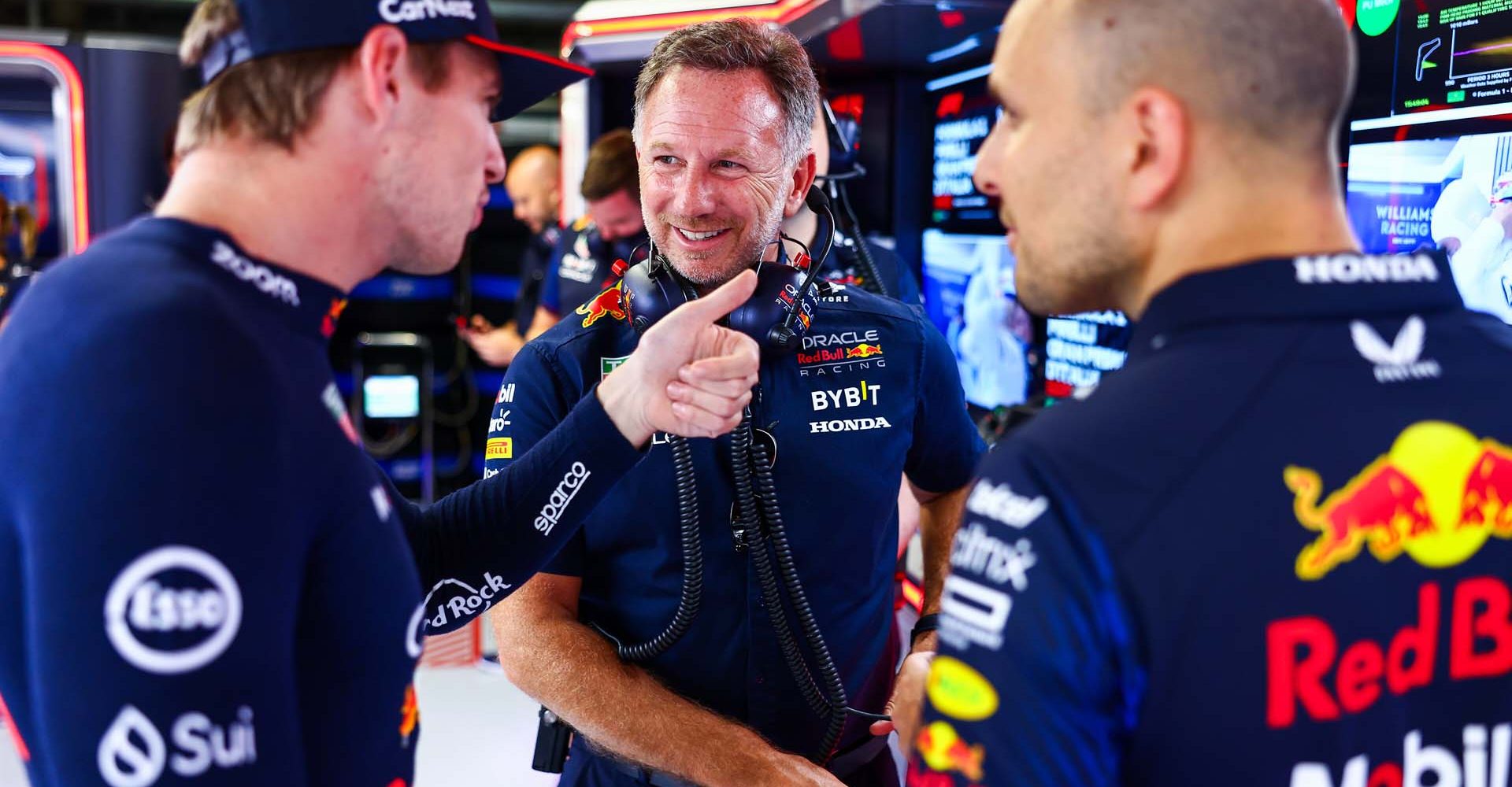 MONZA, ITALY - SEPTEMBER 02: Red Bull Racing Team Principal Christian Horner talks with Max Verstappen of the Netherlands and Oracle Red Bull Racing and race engineer Gianpiero Lambiase in the garage during qualifying ahead of the F1 Grand Prix of Italy at Autodromo Nazionale Monza on September 02, 2023 in Monza, Italy. (Photo by Mark Thompson/Getty Images) // Getty Images / Red Bull Content Pool // SI202309020277 // Usage for editorial use only //