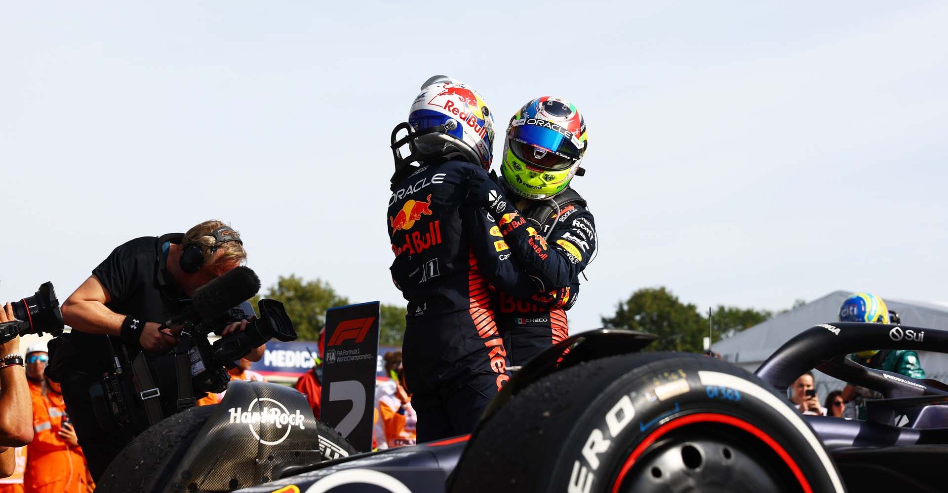 MONZA, ITALY - SEPTEMBER 03: Race winner Max Verstappen of the Netherlands and Oracle Red Bull Racing and Second placed Sergio Perez of Mexico and Oracle Red Bull Racing celebrate in parc ferme during the F1 Grand Prix of Italy at Autodromo Nazionale Monza on September 03, 2023 in Monza, Italy. (Photo by Mark Thompson/Getty Images) // Getty Images / Red Bull Content Pool // SI202309030373 // Usage for editorial use only //