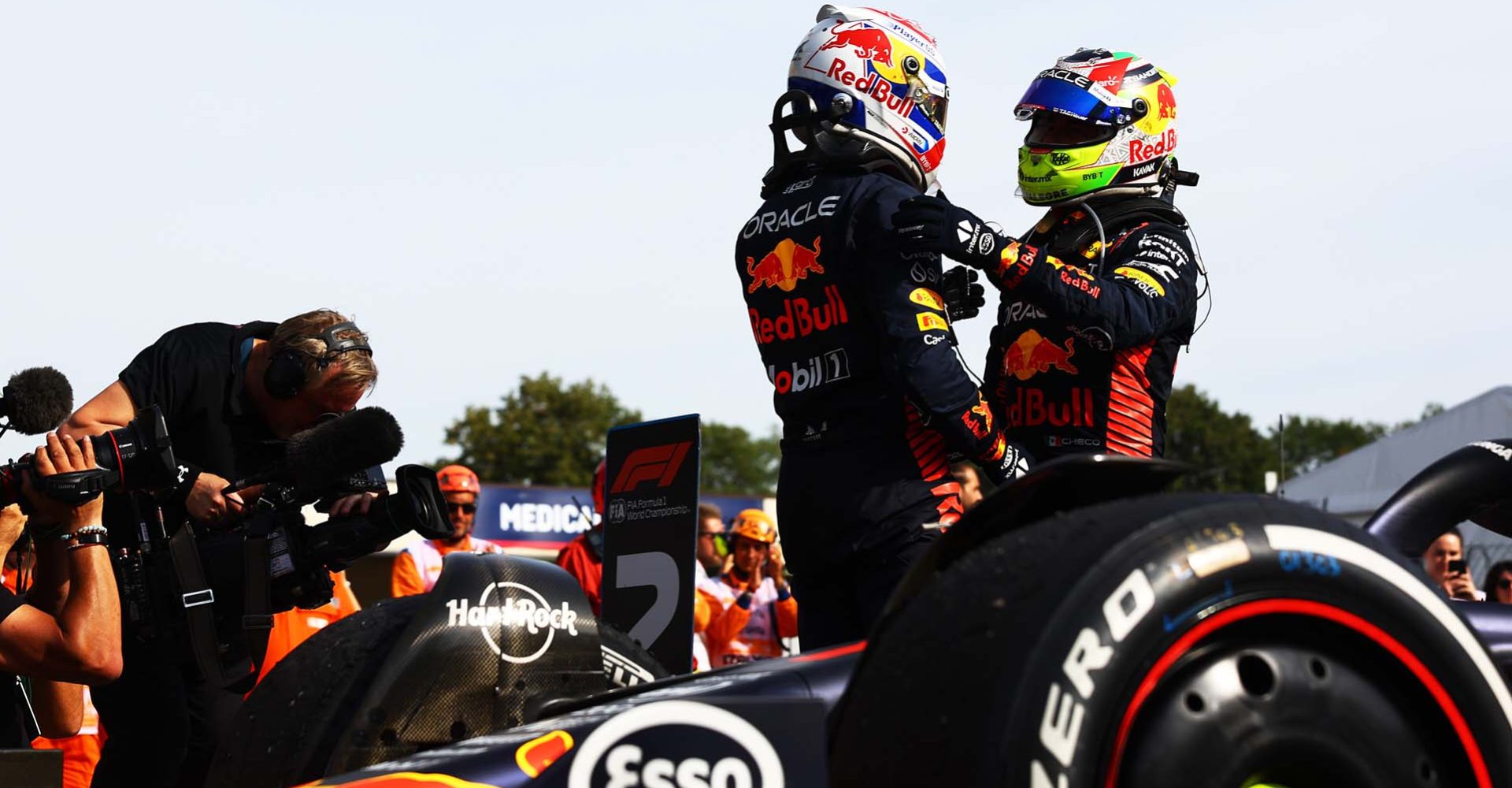 MONZA, ITALY - SEPTEMBER 03: Race winner Max Verstappen of the Netherlands and Oracle Red Bull Racing and Second placed Sergio Perez of Mexico and Oracle Red Bull Racing celebrate in parc ferme during the F1 Grand Prix of Italy at Autodromo Nazionale Monza on September 03, 2023 in Monza, Italy. (Photo by Mark Thompson/Getty Images) // Getty Images / Red Bull Content Pool // SI202309030399 // Usage for editorial use only //