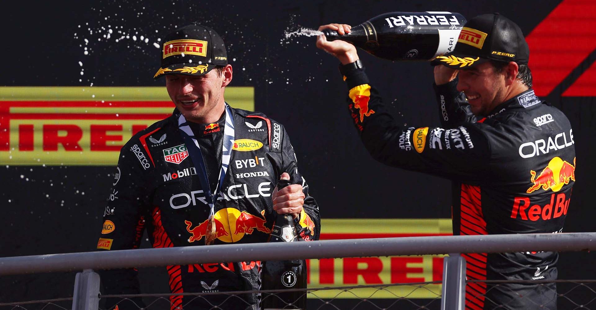 MONZA, ITALY - SEPTEMBER 03: Race winner Max Verstappen of the Netherlands and Oracle Red Bull Racing and Second placed Sergio Perez of Mexico and Oracle Red Bull Racing celebrate on the podium during the F1 Grand Prix of Italy at Autodromo Nazionale Monza on September 03, 2023 in Monza, Italy. (Photo by Ryan Pierse/Getty Images) // Getty Images / Red Bull Content Pool // SI202309030422 // Usage for editorial use only //