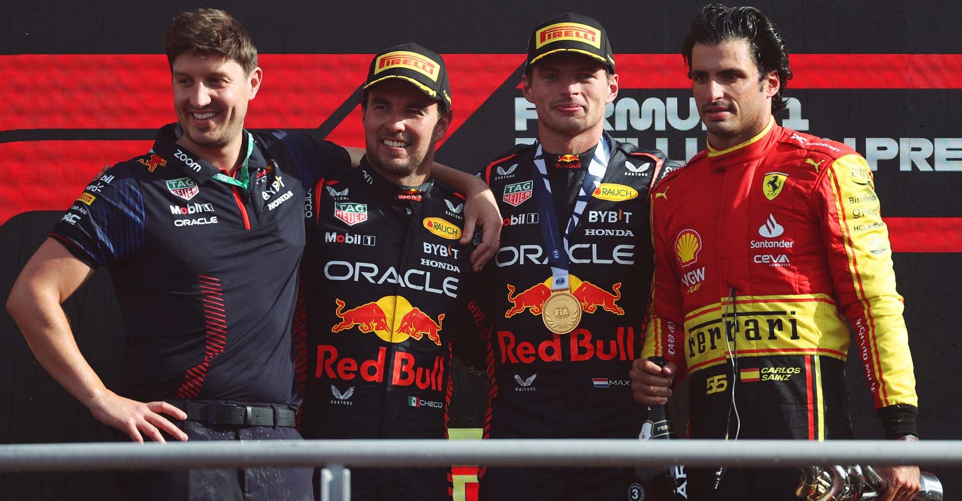 MONZA, ITALY - SEPTEMBER 03: Race winner Max Verstappen of the Netherlands and Oracle Red Bull Racing, Second placed Sergio Perez of Mexico and Oracle Red Bull Racing and Third placed Carlos Sainz of Spain and Ferrari celebrate on the podium during the F1 Grand Prix of Italy at Autodromo Nazionale Monza on September 03, 2023 in Monza, Italy. (Photo by Ryan Pierse/Getty Images) // Getty Images / Red Bull Content Pool // SI202309030433 // Usage for editorial use only //