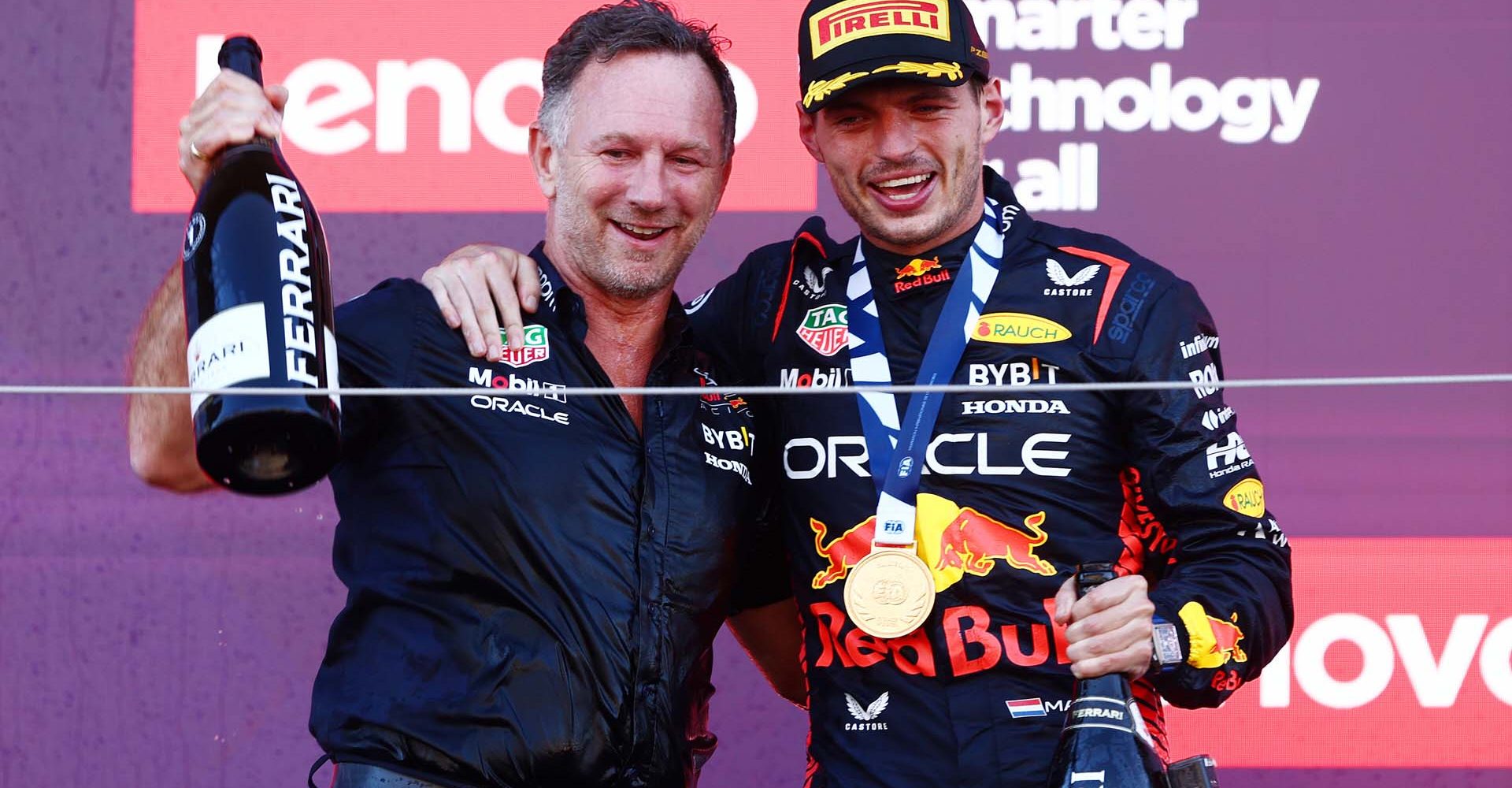 SUZUKA, JAPAN - SEPTEMBER 24: Race winner Max Verstappen of the Netherlands and Oracle Red Bull Racing and Red Bull Racing Team Principal Christian Horner celebrate on the podium during the F1 Grand Prix of Japan at Suzuka International Racing Course on September 24, 2023 in Suzuka, Japan. (Photo by Clive Rose/Getty Images) // Getty Images / Red Bull Content Pool // SI202309240183 // Usage for editorial use only //