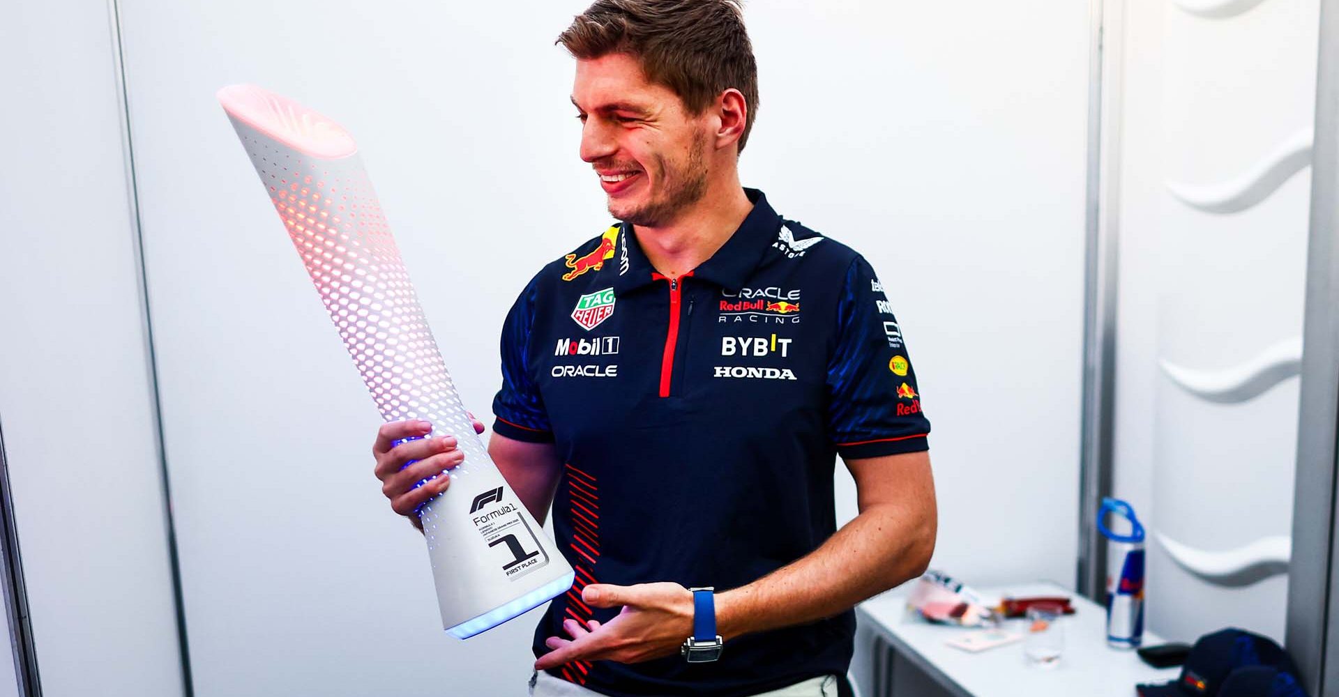 SUZUKA, JAPAN - SEPTEMBER 24: Race winner Max Verstappen of the Netherlands and Oracle Red Bull Racing celebrates with the trophy in his driver room after the F1 Grand Prix of Japan at Suzuka International Racing Course on September 24, 2023 in Suzuka, Japan. (Photo by Mark Thompson/Getty Images) // Getty Images / Red Bull Content Pool // SI202309240257 // Usage for editorial use only //