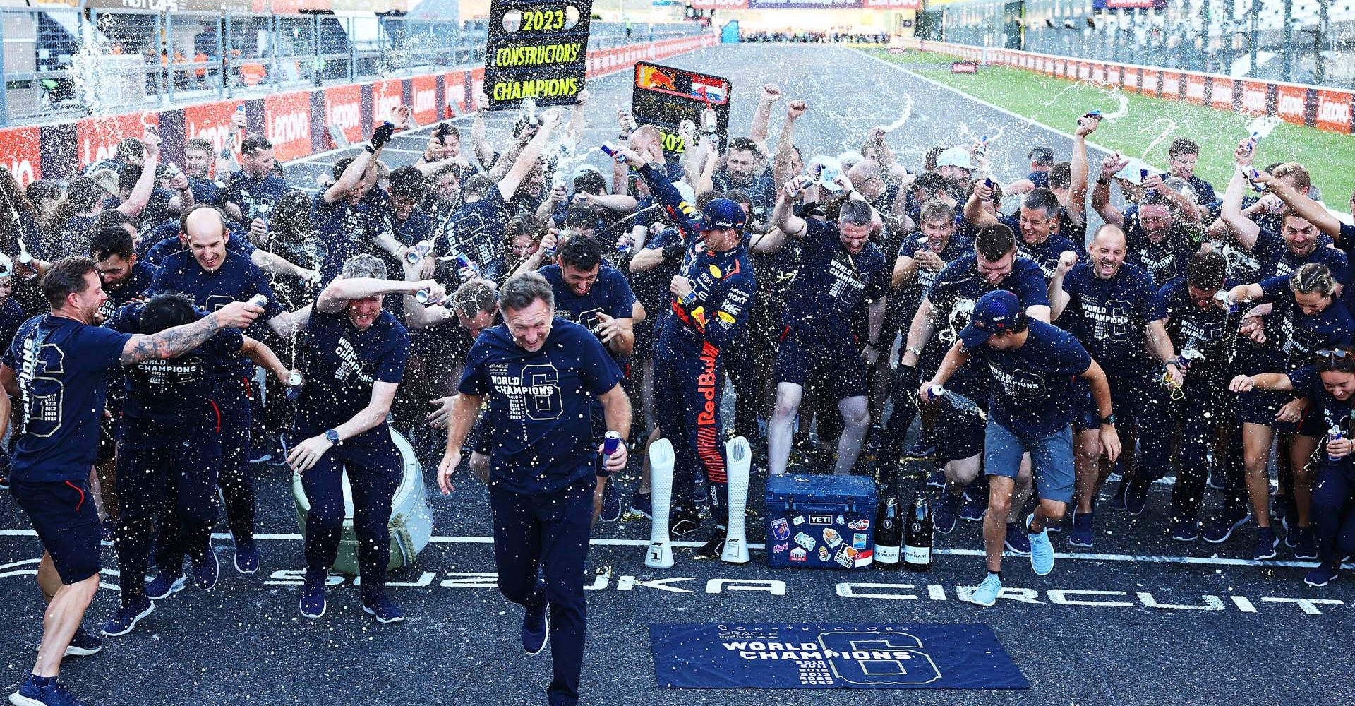 SUZUKA, JAPAN - SEPTEMBER 24: Race winner Max Verstappen of the Netherlands and Oracle Red Bull Racing, Sergio Perez of Mexico and Oracle Red Bull Racing, Red Bull Racing Team Principal Christian Horner and the Red Bull Racing team celebrate their 2023 Constructors' Championship victory after the F1 Grand Prix of Japan at Suzuka International Racing Course on September 24, 2023 in Suzuka, Japan. (Photo by Mark Thompson/Getty Images) // Getty Images / Red Bull Content Pool // SI202309240267 // Usage for editorial use only //