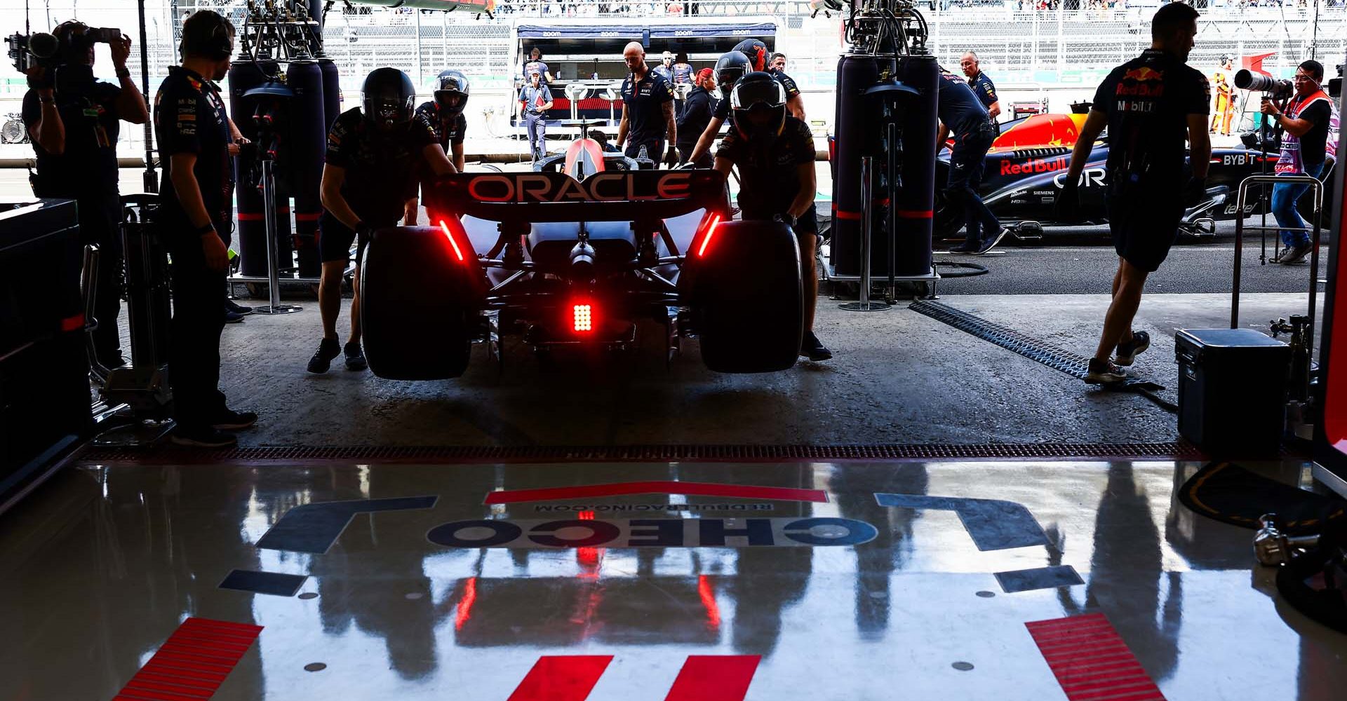 MEXICO CITY, MEXICO - OCTOBER 27: Sergio Perez of Mexico driving the (11) Oracle Red Bull Racing RB19 is pushed back into the garage during practice ahead of the F1 Grand Prix of Mexico at Autodromo Hermanos Rodriguez on October 27, 2023 in Mexico City, Mexico. (Photo by Mark Thompson/Getty Images) // Getty Images / Red Bull Content Pool // SI202310271610 // Usage for editorial use only //