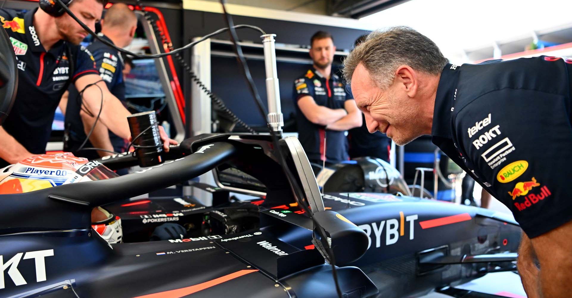 MONTE-CARLO, MONACO - MAY 26: Red Bull Racing Team Principal Christian Horner talks with Max Verstappen of the Netherlands and Oracle Red Bull Racing in the garage during practice ahead of the F1 Grand Prix of Monaco at Circuit de Monaco on May 26, 2023 in Monte-Carlo, Monaco. (Photo by Dan Mullan/Getty Images)