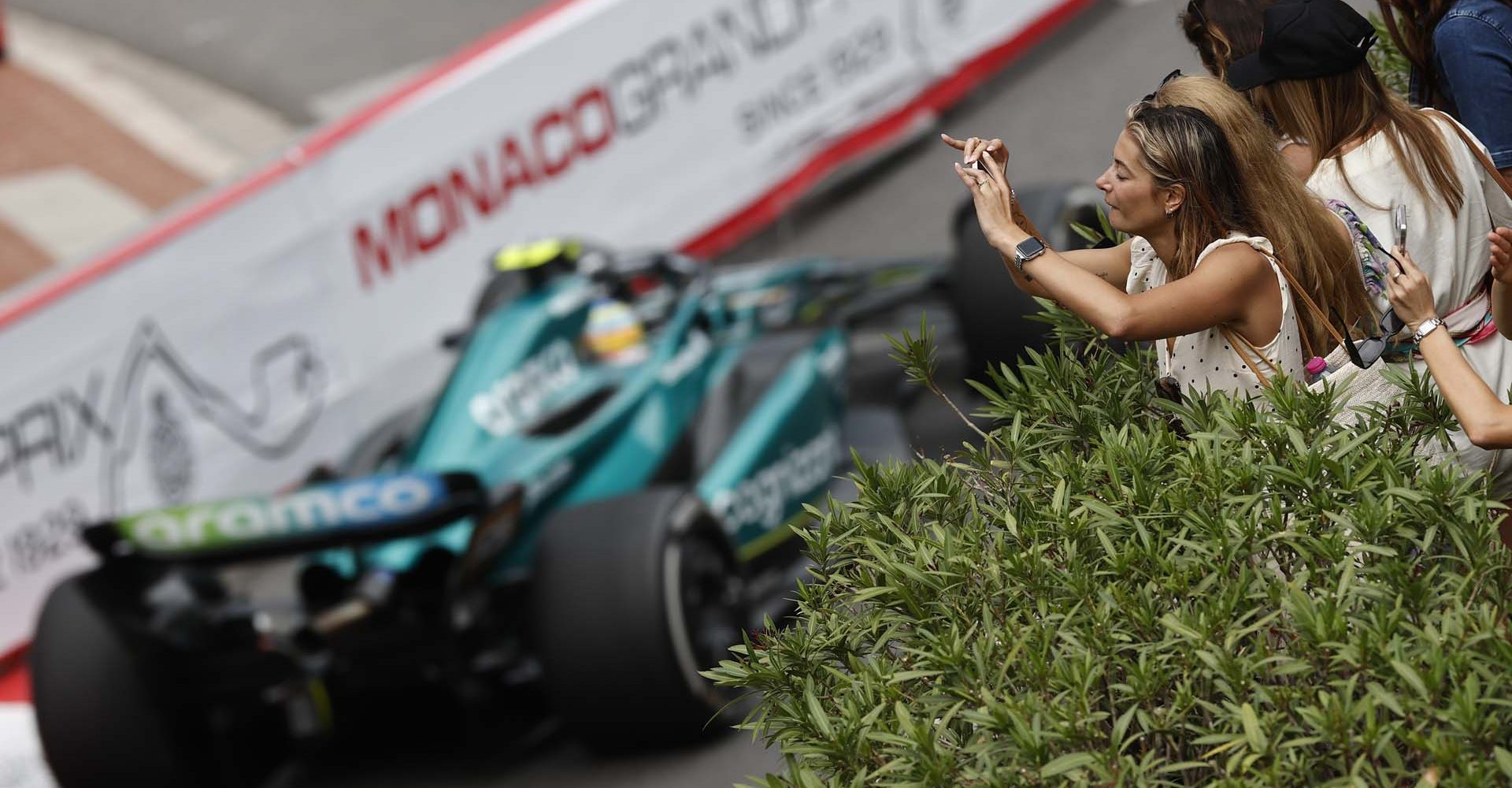 action, atmosphere, Circuit de Monaco, GP2306a, F1, GP, Monaco
Fans take photos as Fernando Alonso, Aston Martin AMR23, passes