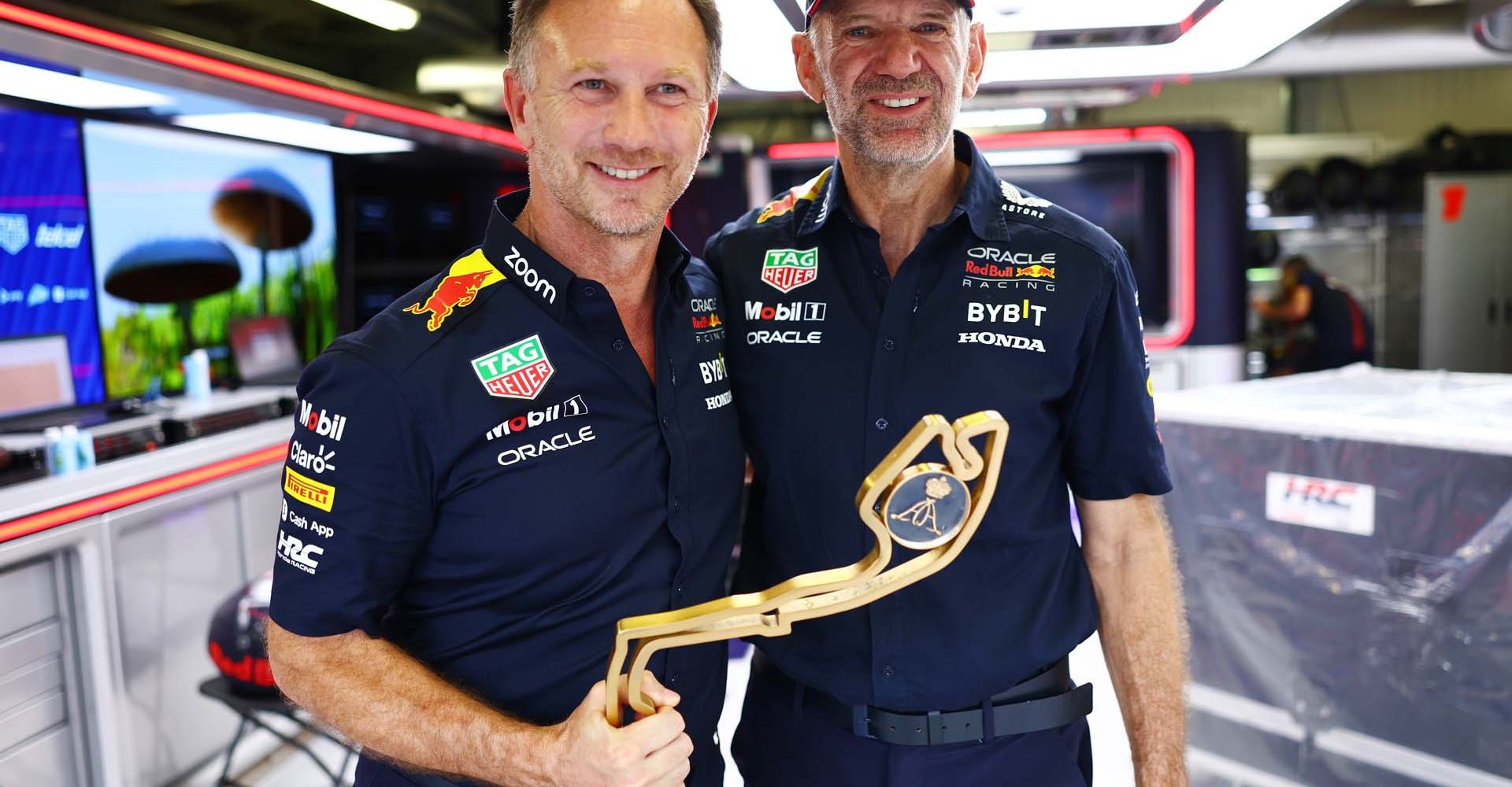 MONTE-CARLO, MONACO - MAY 28: Red Bull Racing Team Principal Christian Horner and Adrian Newey, the Chief Technical Officer of Red Bull Racing pose for a photo with the winners trophy during the F1 Grand Prix of Monaco at Circuit de Monaco on May 28, 2023 in Monte-Carlo, Monaco. (Photo by Mark Thompson/Getty Images)