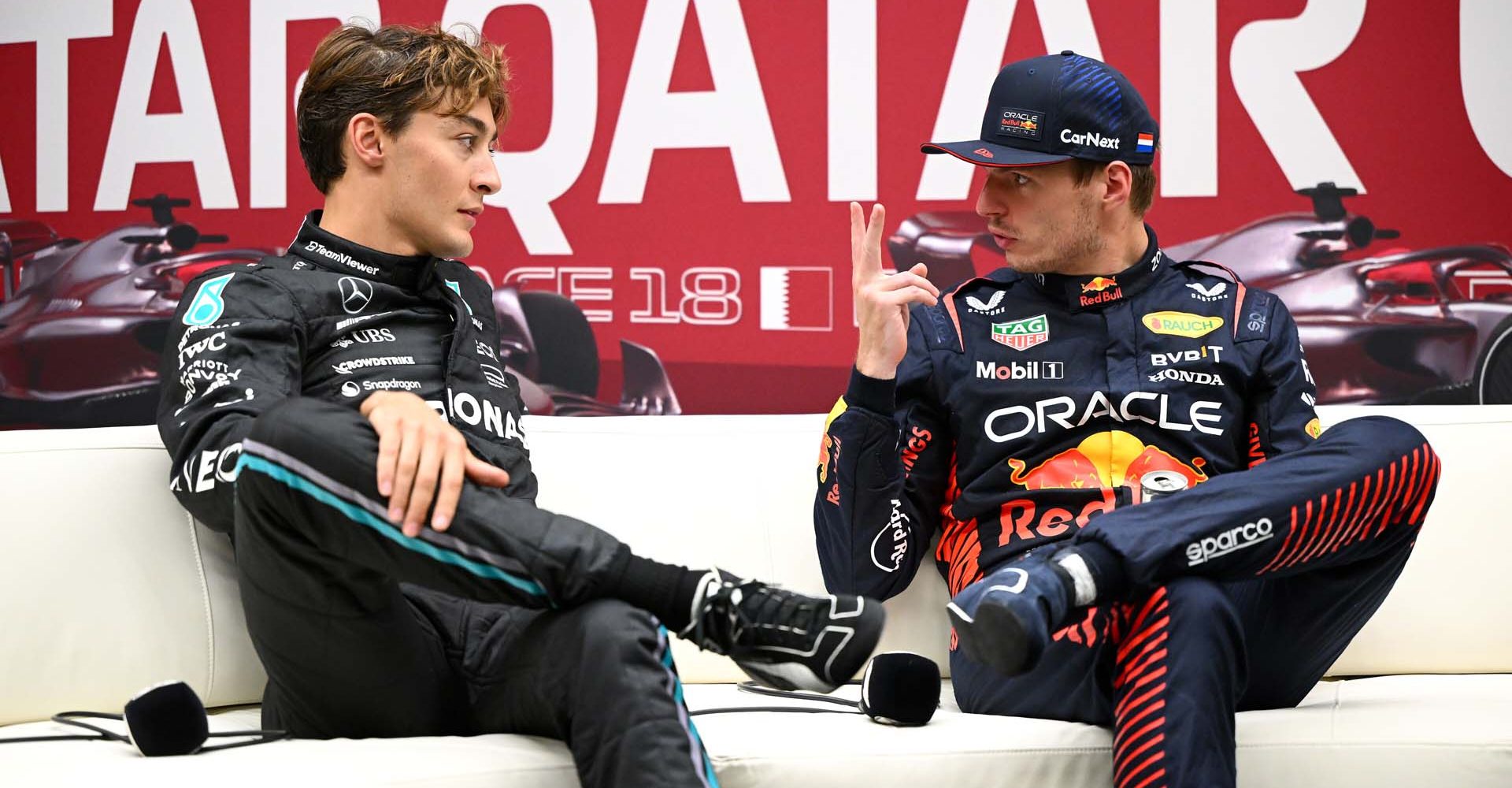 LUSAIL CITY, QATAR - OCTOBER 06: Pole position qualifier Max Verstappen of the Netherlands and Oracle Red Bull Racing and Second placed qualifier George Russell of Great Britain and Mercedes attend the press conference after qualifying ahead of the F1 Grand Prix of Qatar at Lusail International Circuit on October 06, 2023 in Lusail City, Qatar. (Photo by Clive Mason/Getty Images) // Getty Images / Red Bull Content Pool // SI202310061604 // Usage for editorial use only //