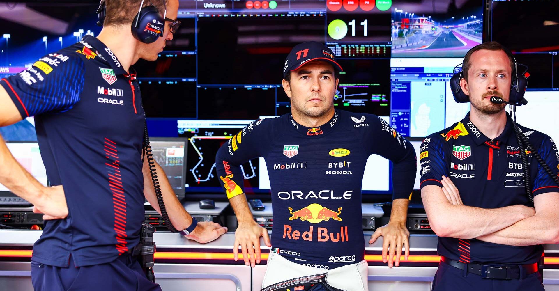 LUSAIL CITY, QATAR - OCTOBER 07: Sergio Perez of Mexico and Oracle Red Bull Racing prepares to drive in the garage prior to the Sprint ahead of the F1 Grand Prix of Qatar at Lusail International Circuit on October 07, 2023 in Lusail City, Qatar. (Photo by Mark Thompson/Getty Images) // Getty Images / Red Bull Content Pool // SI202310070445 // Usage for editorial use only //