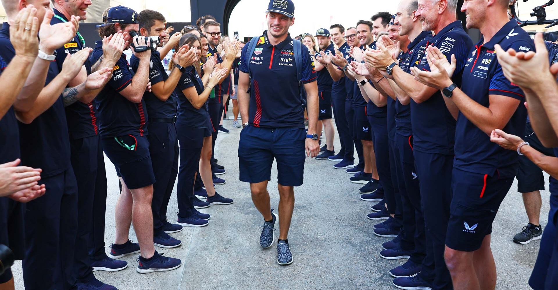 LUSAIL CITY, QATAR - OCTOBER 08: 2023 F1 World Drivers Champion Max Verstappen of the Netherlands and Oracle Red Bull Racing is greeted by a guard of honour in the Paddock prior to the F1 Grand Prix of Qatar at Lusail International Circuit on October 08, 2023 in Lusail City, Qatar. (Photo by Mark Thompson/Getty Images) // Getty Images / Red Bull Content Pool // SI202310080179 // Usage for editorial use only //