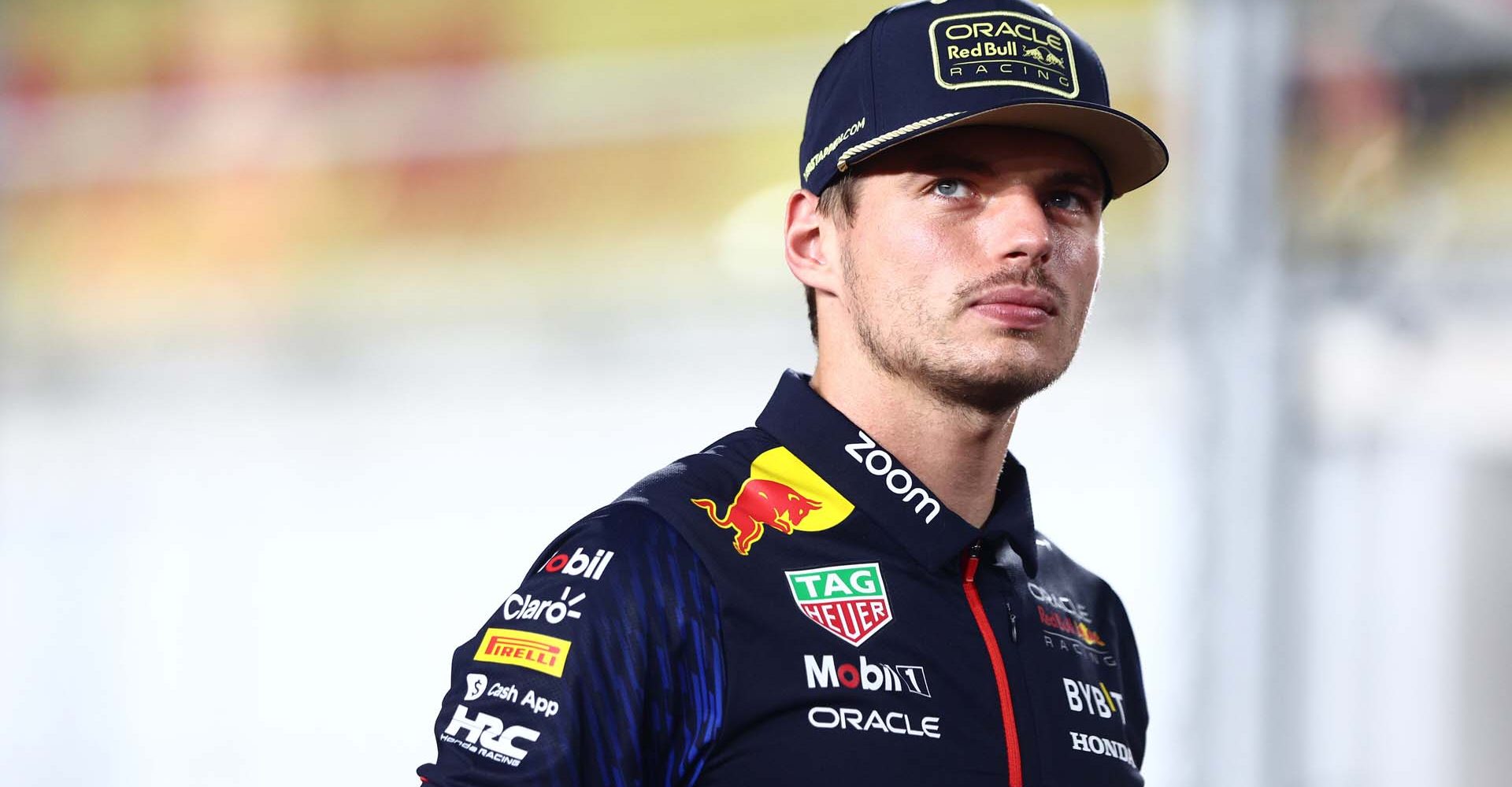 LUSAIL CITY, QATAR - OCTOBER 08: Max Verstappen of the Netherlands and Oracle Red Bull Racing looks on from the drivers parade prior to the F1 Grand Prix of Qatar at Lusail International Circuit on October 08, 2023 in Lusail City, Qatar. (Photo by Clive Rose/Getty Images) // Getty Images / Red Bull Content Pool // SI202310080325 // Usage for editorial use only //