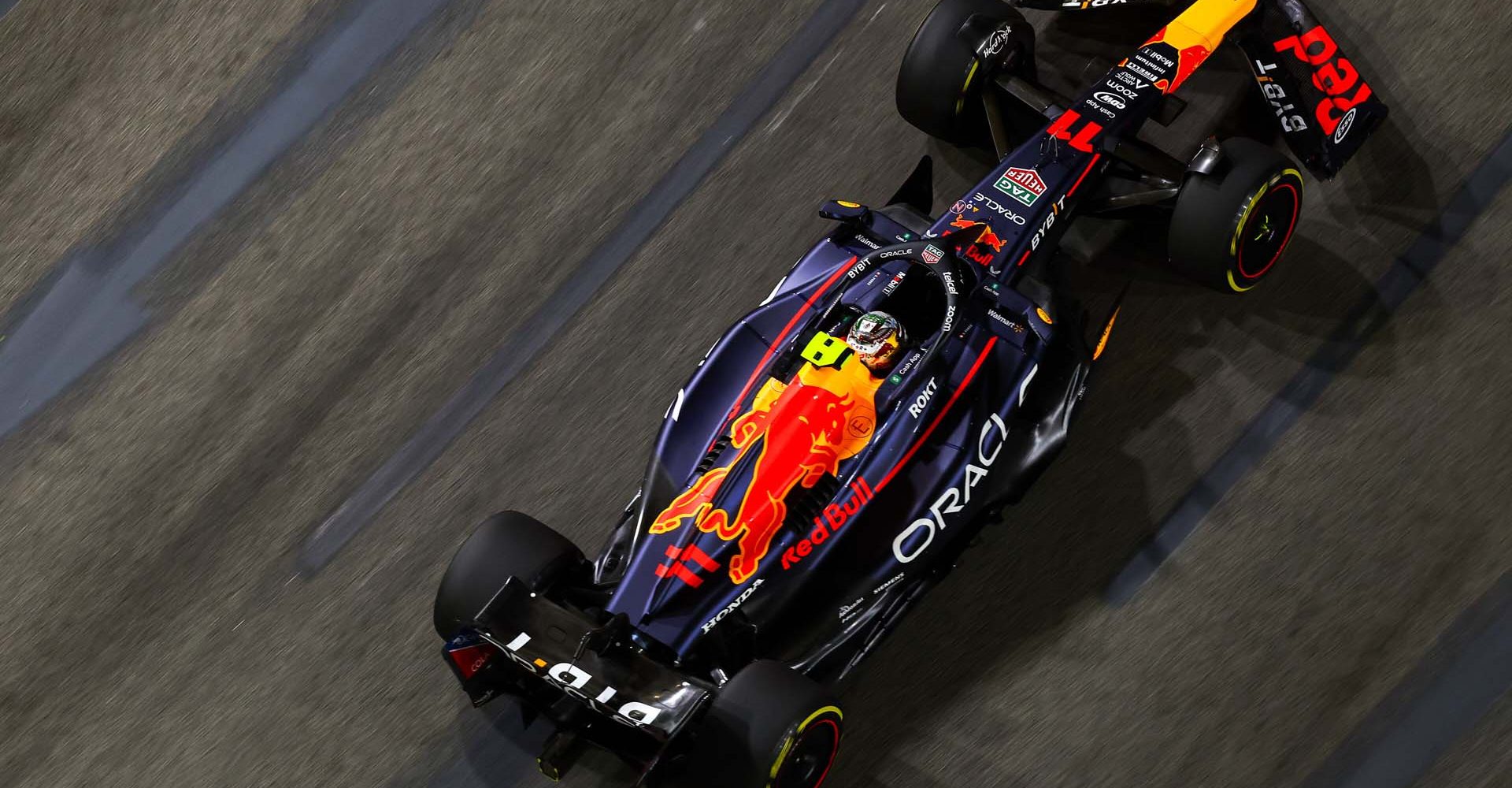 SINGAPORE, SINGAPORE - SEPTEMBER 15: Sergio Perez of Mexico driving the (11) Oracle Red Bull Racing RB19 on track during practice ahead of the F1 Grand Prix of Singapore at Marina Bay Street Circuit on September 15, 2023 in Singapore, Singapore. (Photo by Mark Thompson/Getty Images) // Getty Images / Red Bull Content Pool // SI202309150627 // Usage for editorial use only //