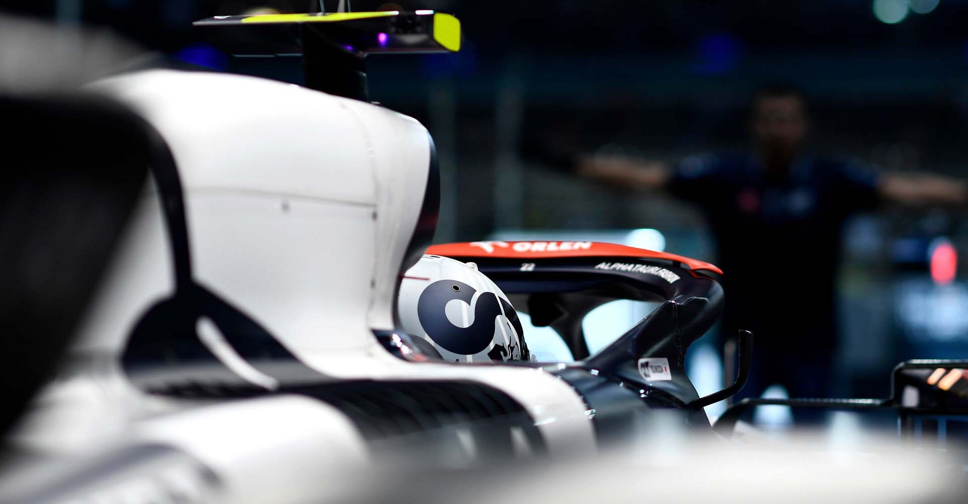 SINGAPORE, SINGAPORE - SEPTEMBER 16: Yuki Tsunoda of Japan and Scuderia AlphaTauri prepares to drive in the garage during qualifying ahead of the F1 Grand Prix of Singapore at Marina Bay Street Circuit on September 16, 2023 in Singapore, Singapore. (Photo by Rudy Carezzevoli/Getty Images) // Getty Images / Red Bull Content Pool // SI202309160454 // Usage for editorial use only //