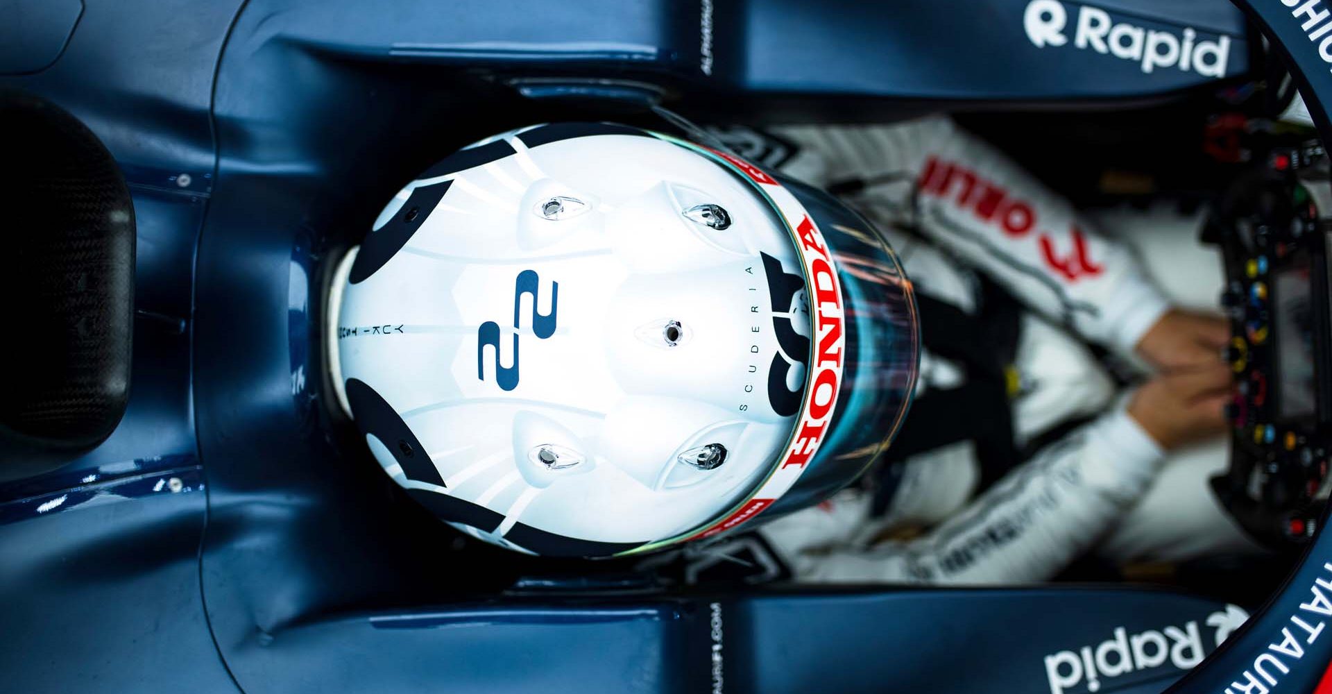 SINGAPORE, SINGAPORE - SEPTEMBER 16: Yuki Tsunoda of Japan and Scuderia AlphaTauri prepares to drive in the garage during qualifying ahead of the F1 Grand Prix of Singapore at Marina Bay Street Circuit on September 16, 2023 in Singapore, Singapore. (Photo by Rudy Carezzevoli/Getty Images) // Getty Images / Red Bull Content Pool // SI202309160489 // Usage for editorial use only //