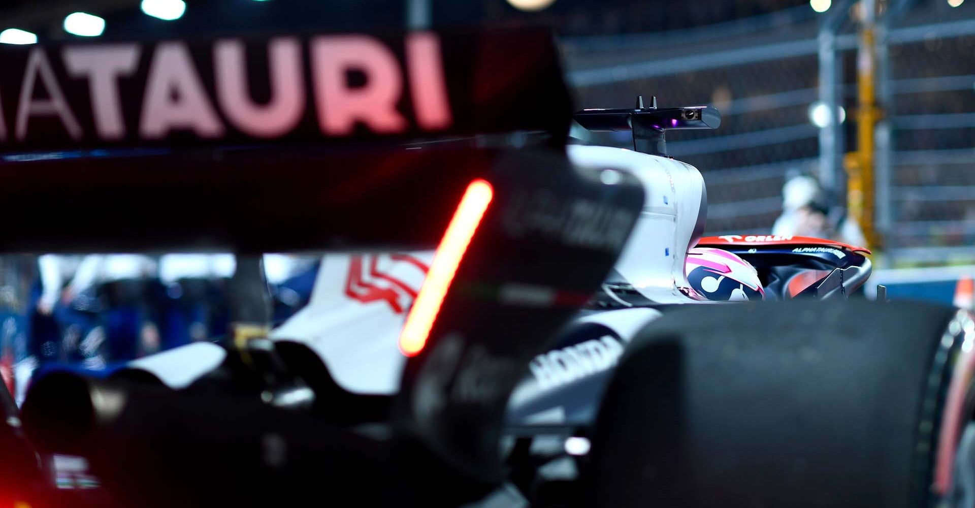 SINGAPORE, SINGAPORE - SEPTEMBER 16: Liam Lawson of New Zealand driving the (40) Scuderia AlphaTauri AT04 leaves the garage during qualifying ahead of the F1 Grand Prix of Singapore at Marina Bay Street Circuit on September 16, 2023 in Singapore, Singapore. (Photo by Rudy Carezzevoli/Getty Images) // Getty Images / Red Bull Content Pool // SI202309160531 // Usage for editorial use only //