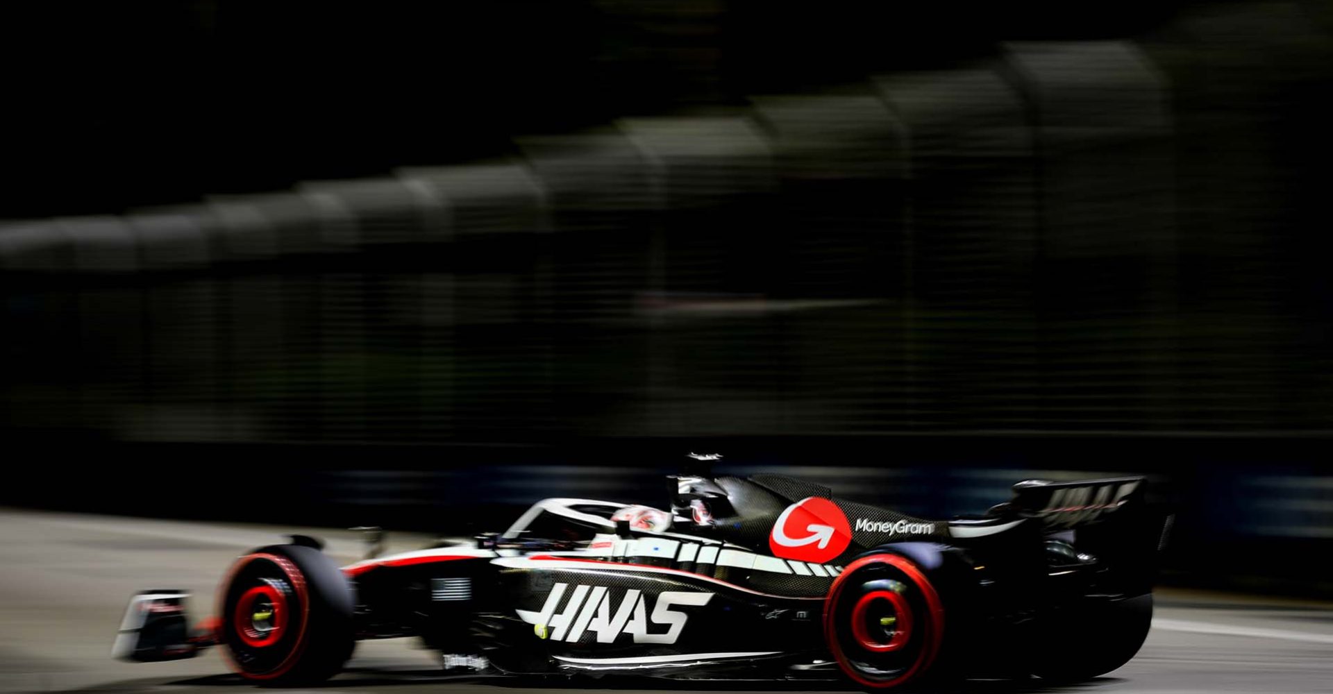 MARINA BAY STREET CIRCUIT, SINGAPORE - SEPTEMBER 16: Kevin Magnussen, Haas VF-23 during the Singapore GP at Marina Bay Street Circuit on Saturday September 16, 2023 in Singapore, Singapore. (Photo by Jake Grant / LAT Images)