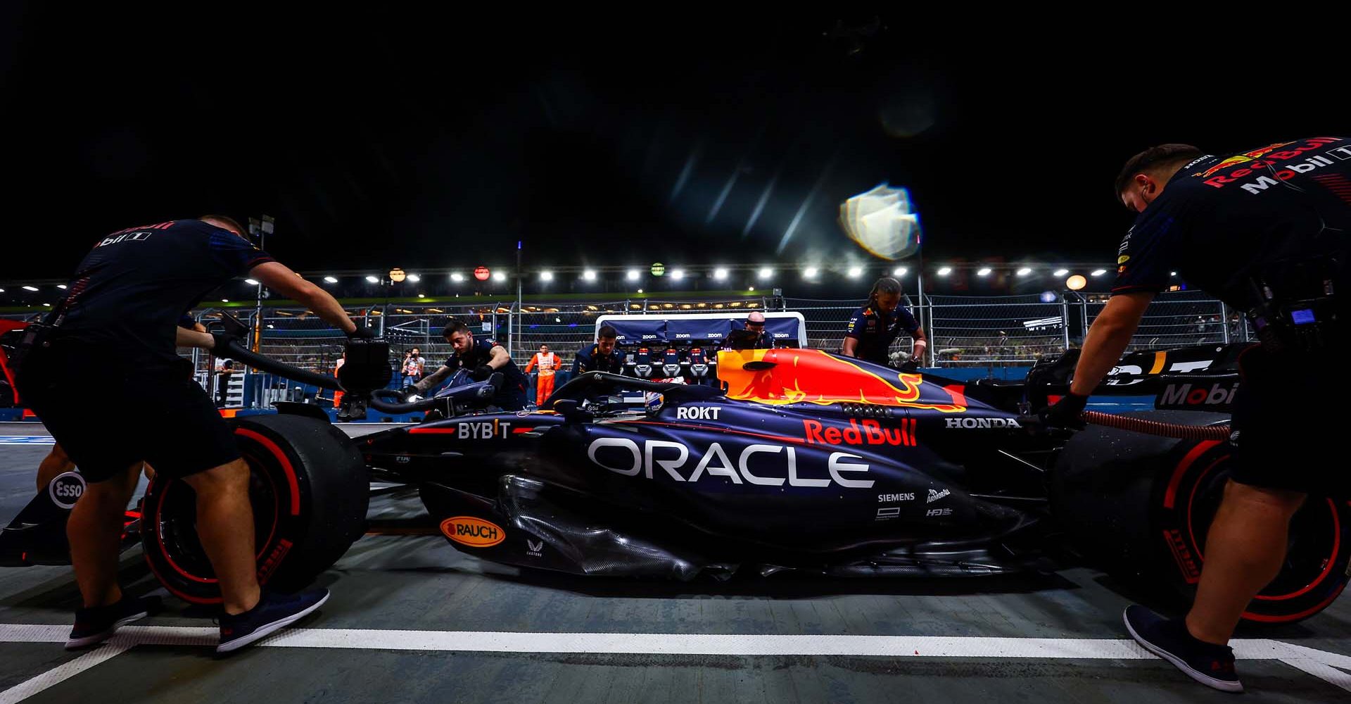 SINGAPORE, SINGAPORE - SEPTEMBER 16: Max Verstappen of the Netherlands driving the (1) Oracle Red Bull Racing RB19 stops in the Pitlane during qualifying ahead of the F1 Grand Prix of Singapore at Marina Bay Street Circuit on September 16, 2023 in Singapore, Singapore. (Photo by Mark Thompson/Getty Images) // Getty Images / Red Bull Content Pool // SI202309160393 // Usage for editorial use only //