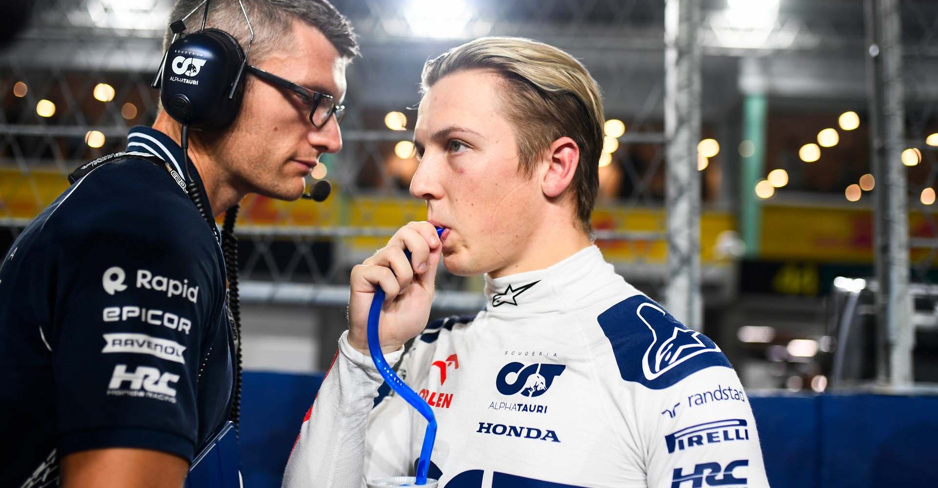 SINGAPORE, SINGAPORE - SEPTEMBER 17: Liam Lawson of New Zealand and Scuderia AlphaTauri prepares to drive on the grid prior to the F1 Grand Prix of Singapore at Marina Bay Street Circuit on September 17, 2023 in Singapore, Singapore. (Photo by Rudy Carezzevoli/Getty Images) // Getty Images / Red Bull Content Pool // SI202309170235 // Usage for editorial use only //