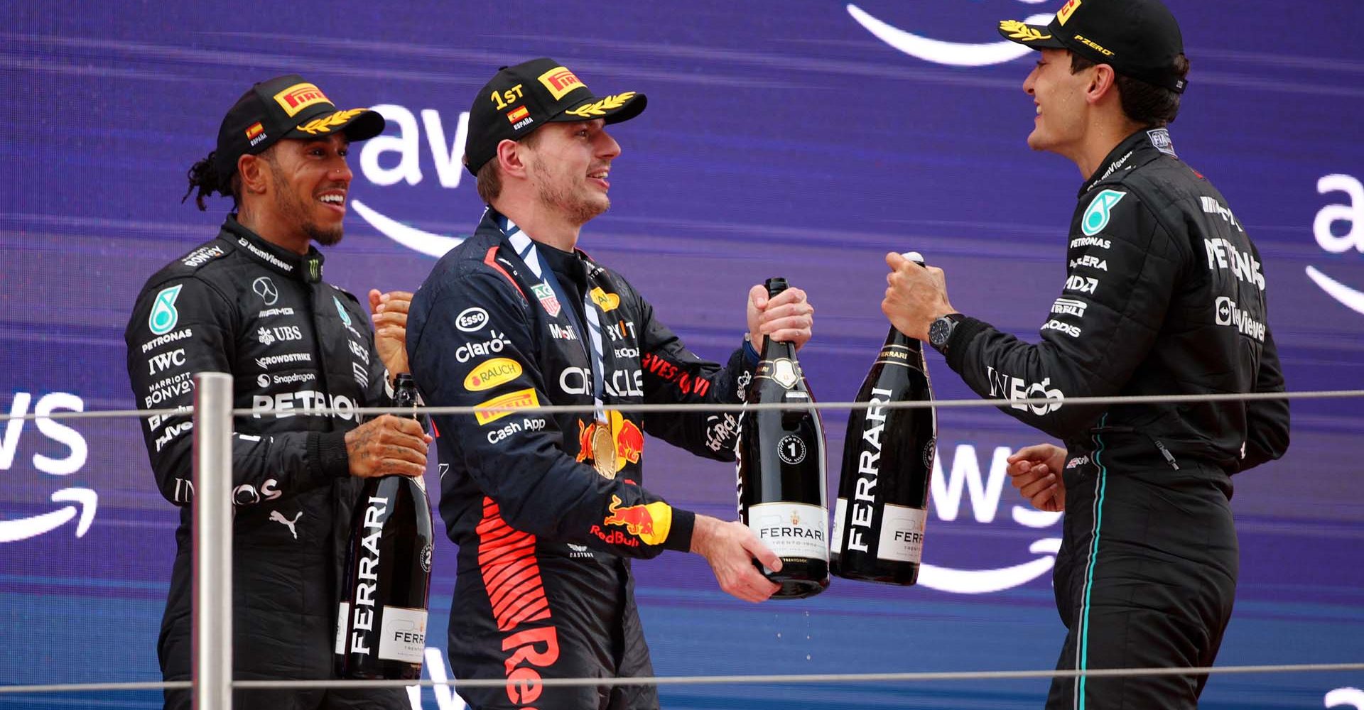 BARCELONA, SPAIN - JUNE 04: Race Winner Max Verstappen of the Netherlands and Oracle Red Bull Racing, Second placed Lewis Hamilton of Great Britain and Mercedes and Third placed George Russell of Great Britain driving the (63) Mercedes AMG Petronas F1 Team W14 celebrate on the podium during the F1 Grand Prix of Spain at Circuit de Barcelona-Catalunya on June 04, 2023 in Barcelona, Spain. (Photo by Adam Pretty/Getty Images)