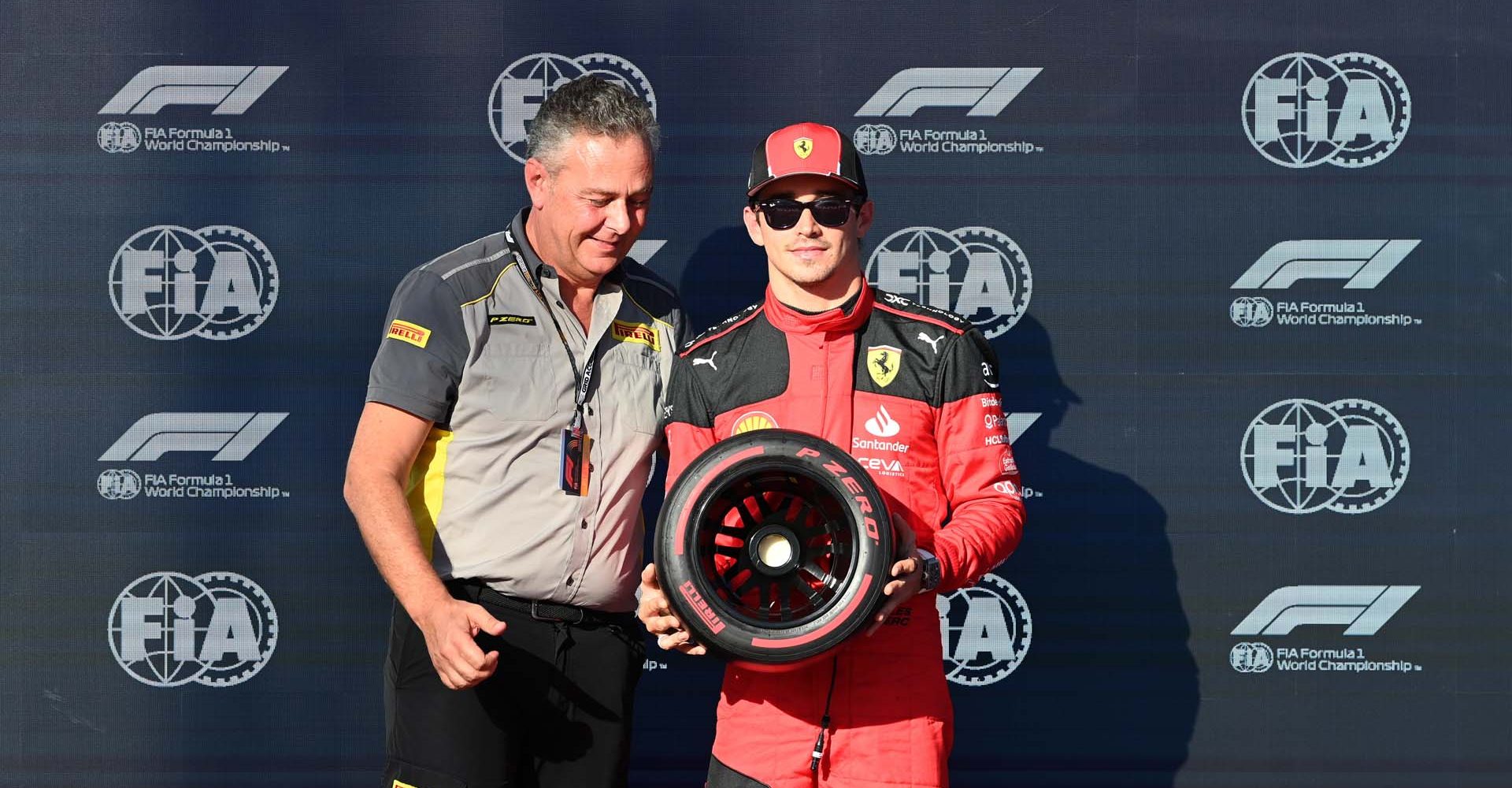 CIRCUIT OF THE AMERICAS, UNITED STATES OF AMERICA - OCTOBER 20: Pole man Charles Leclerc, Scuderia Ferrari, receives his Pirelli Pole Position Award from Mario Isola, Racing Manager, Pirelli Motorsport during the United States GP at Circuit of the Americas on Friday October 20, 2023 in Austin, United States of America. (Photo by Mark Sutton / LAT Images)