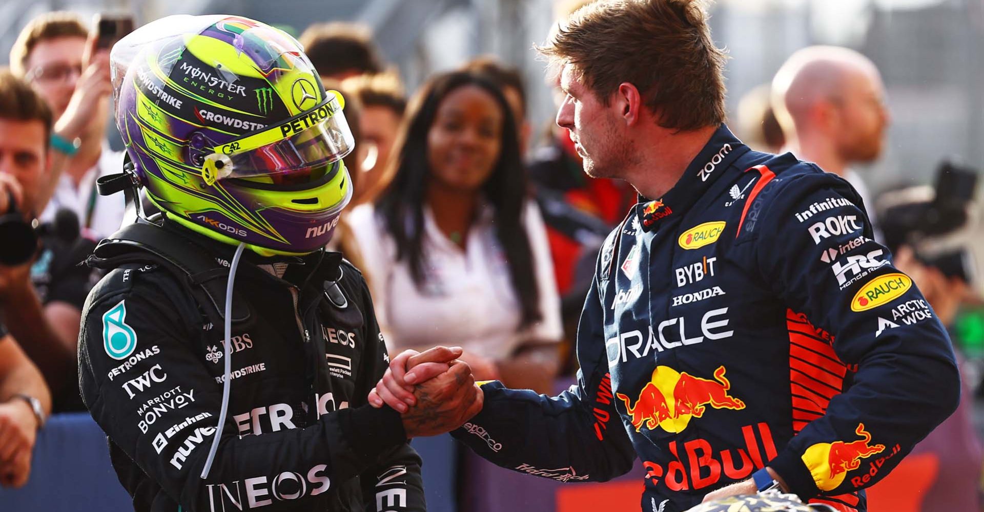 AUSTIN, TEXAS - OCTOBER 21: Sprint winner Max Verstappen of the Netherlands and Oracle Red Bull Racing shakes hands with Second placed Lewis Hamilton of Great Britain and Mercedes in parc ferme after the Sprint ahead of the F1 Grand Prix of United States at Circuit of The Americas on October 21, 2023 in Austin, Texas. (Photo by Mark Thompson/Getty Images) // Getty Images / Red Bull Content Pool // SI202310220063 // Usage for editorial use only //