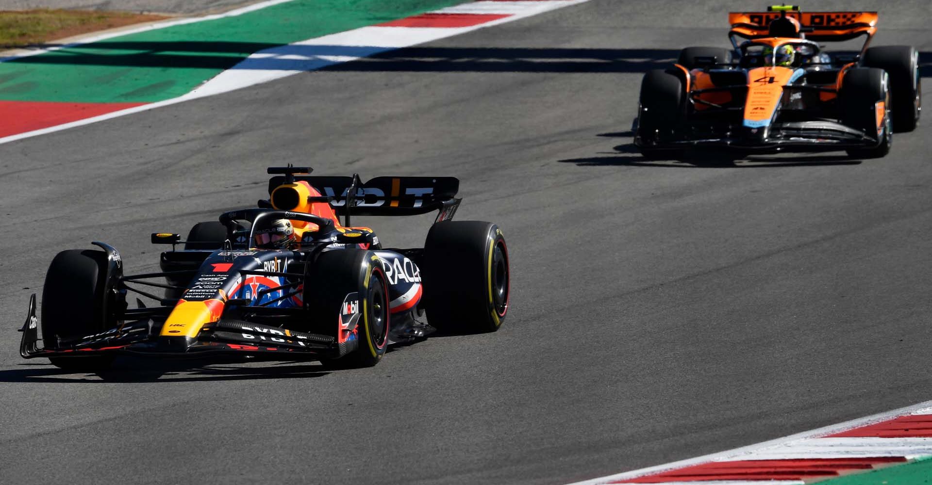 AUSTIN, TEXAS - OCTOBER 22: Max Verstappen of the Netherlands driving the (1) Oracle Red Bull Racing RB19 leads Lando Norris of Great Britain driving the (4) McLaren MCL60 Mercedes on track during the F1 Grand Prix of United States at Circuit of The Americas on October 22, 2023 in Austin, Texas. (Photo by Rudy Carezzevoli/Getty Images) // Getty Images / Red Bull Content Pool // SI202310230023 // Usage for editorial use only //