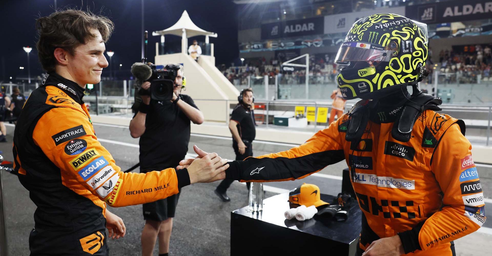 Oscar Piastri, McLaren F1 Team, and pole man Lando Norris, McLaren F1 Team, congratulate each other in Parc Ferme