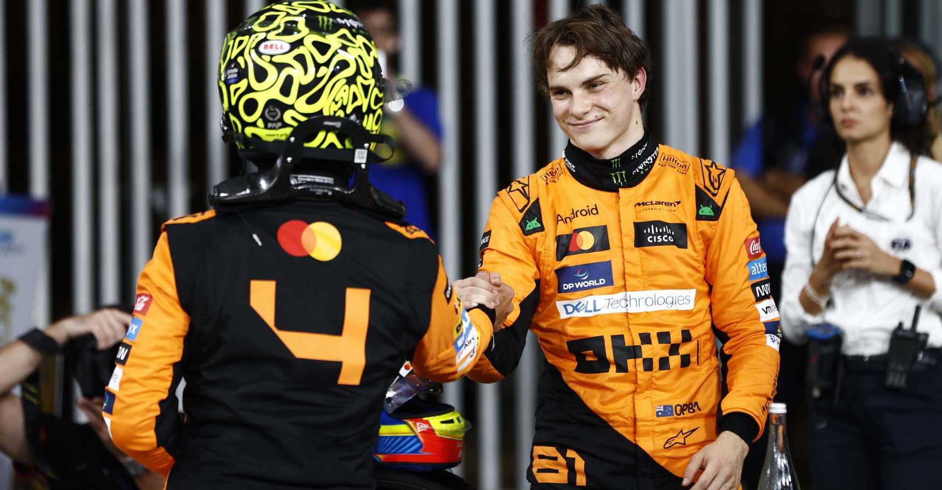 pole man Lando Norris, McLaren F1 Team, is congratulated by Oscar Piastri, McLaren F1 Team, in Parc Ferme