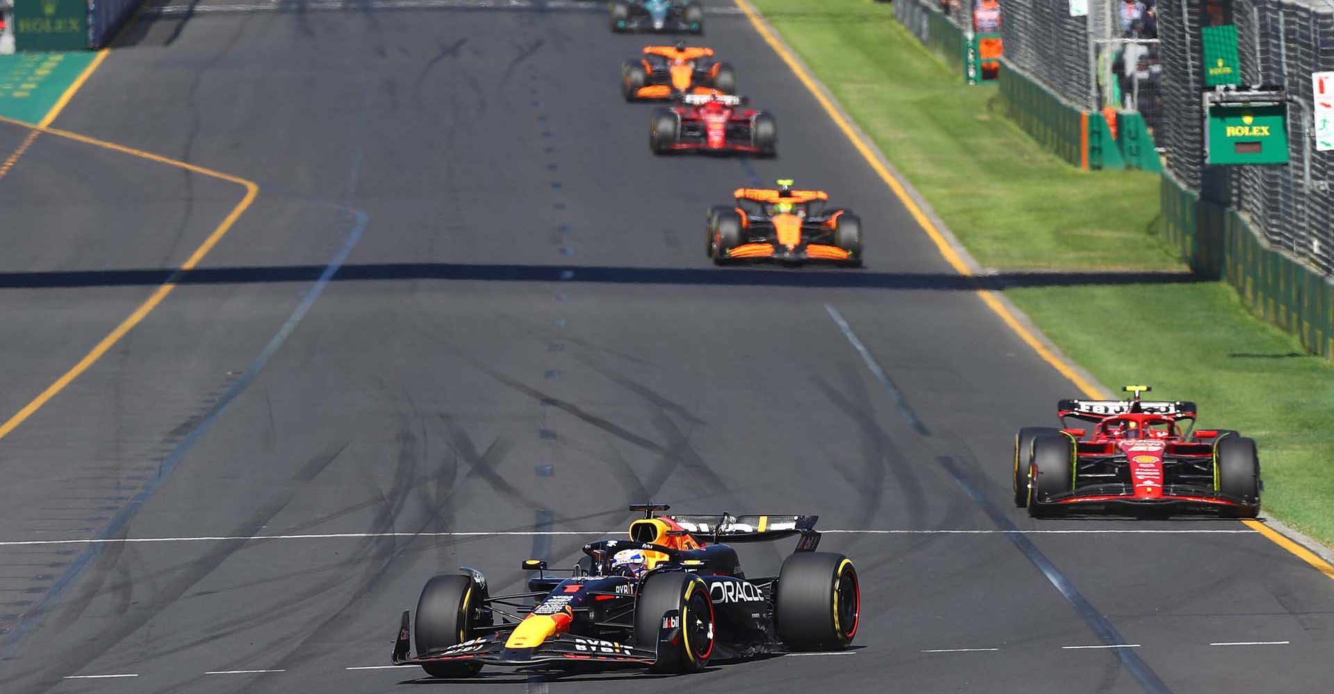 MELBOURNE, AUSTRALIA - MARCH 24: Max Verstappen of the Netherlands driving the (1) Oracle Red Bull Racing RB20 leads Carlos Sainz of Spain driving (55) the Ferrari SF-24 during the F1 Grand Prix of Australia at Albert Park Circuit on March 24, 2024 in Melbourne, Australia. (Photo by Peter Fox/Getty Images) // Getty Images / Red Bull Content Pool // SI202403240233 // Usage for editorial use only //