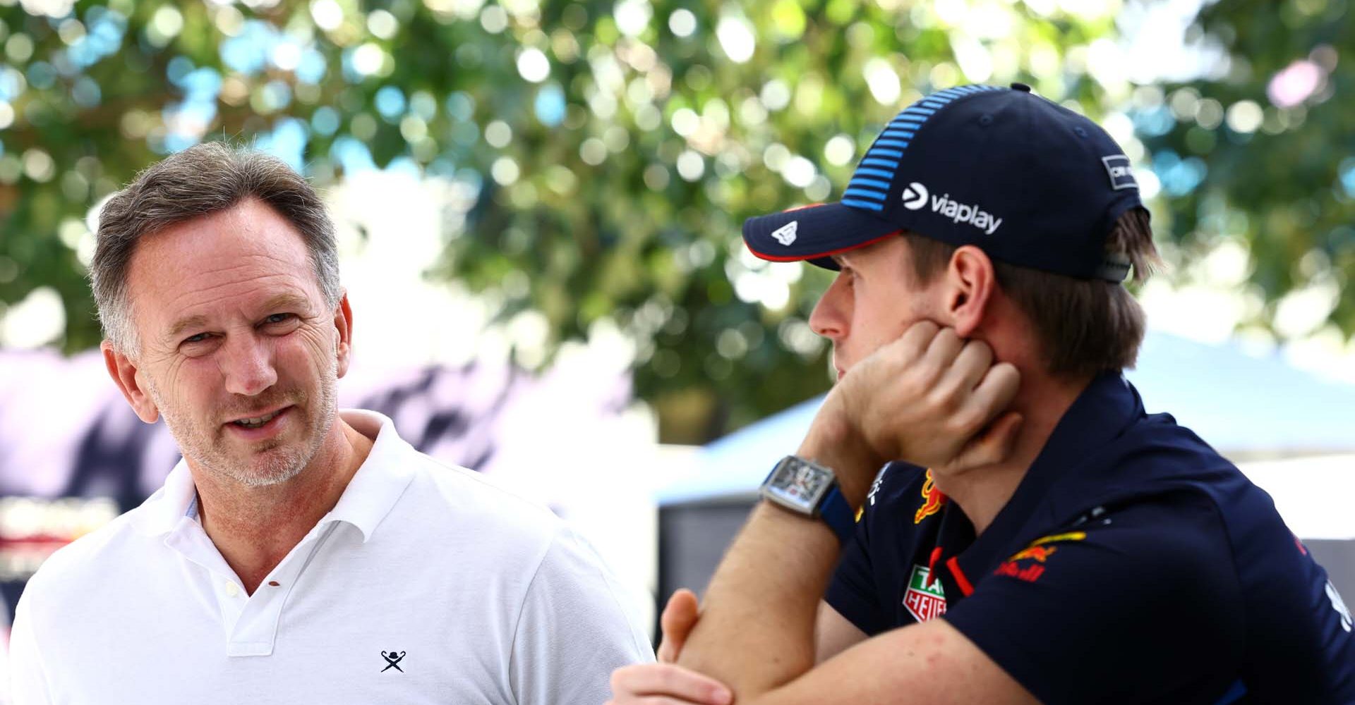 MELBOURNE, AUSTRALIA - MARCH 21: Oracle Red Bull Racing Team Principal Christian Horner and Max Verstappen of the Netherlands and Oracle Red Bull Racing talk in the Paddock during previews ahead of the F1 Grand Prix of Australia at Albert Park Circuit on March 21, 2024 in Melbourne, Australia. (Photo by Mark Thompson/Getty Images) // Getty Images / Red Bull Content Pool // SI202403210095 // Usage for editorial use only //