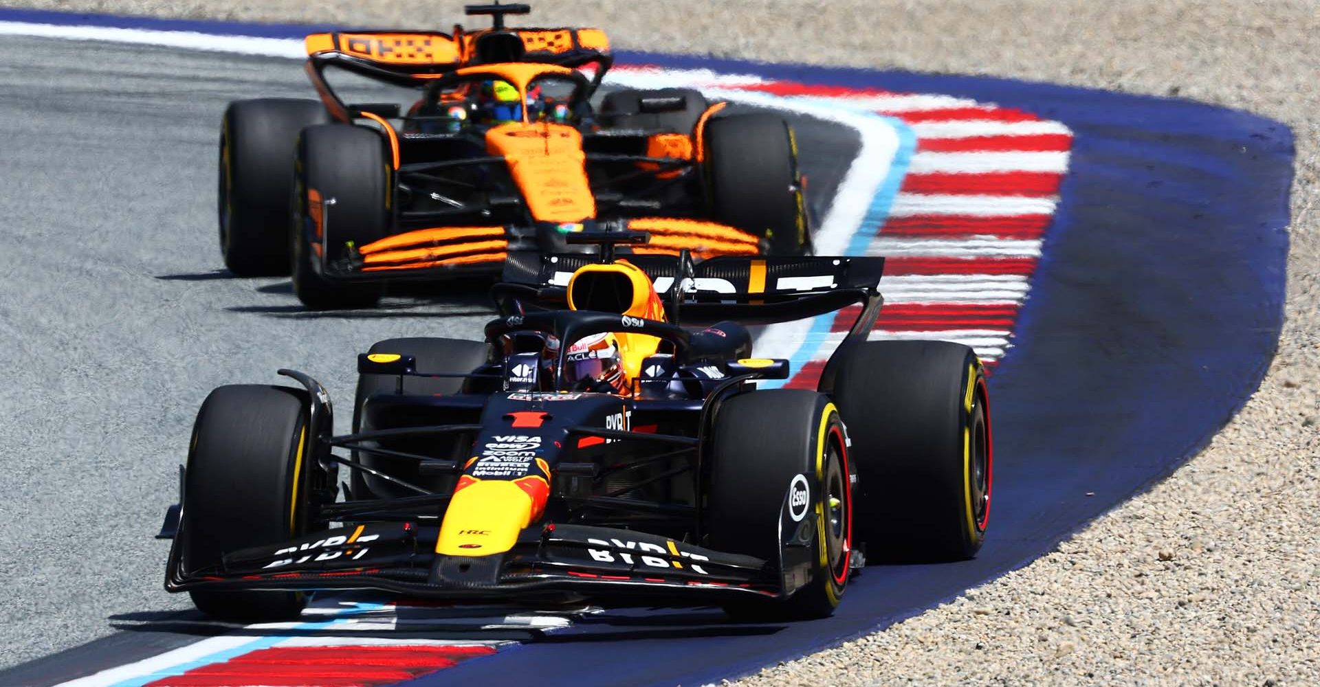 SPIELBERG, AUSTRIA - JUNE 29: Max Verstappen of the Netherlands driving the (1) Oracle Red Bull Racing RB20 leads Oscar Piastri of Australia driving the (81) McLaren MCL38 Mercedes during the Sprint ahead of the F1 Grand Prix of Austria at Red Bull Ring on June 29, 2024 in Spielberg, Austria. (Photo by Clive Rose/Getty Images) // Getty Images / Red Bull Content Pool // SI202406290110 // Usage for editorial use only //