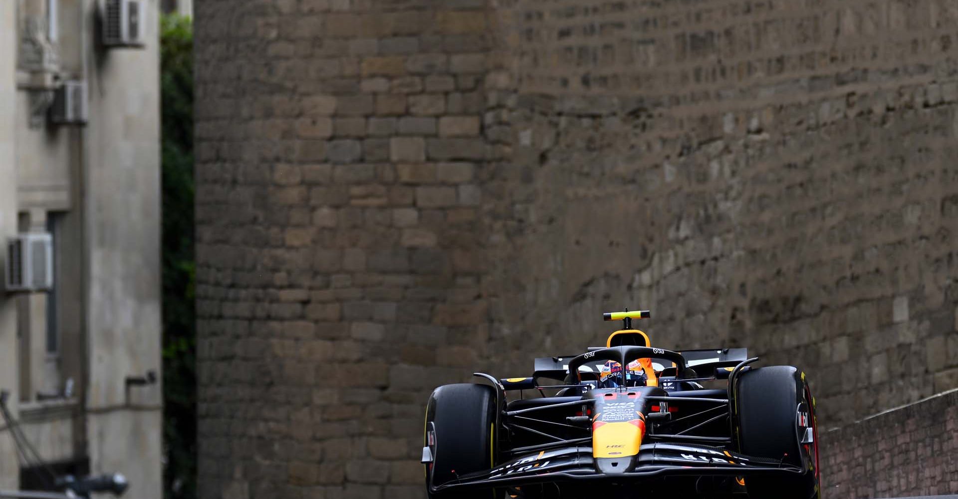 BAKU, AZERBAIJAN - SEPTEMBER 13: Sergio Perez of Mexico driving the (11) Oracle Red Bull Racing RB20 on track during practice ahead of the F1 Grand Prix of Azerbaijan at Baku City Circuit on September 13, 2024 in Baku, Azerbaijan. (Photo by Clive Mason/Getty Images)