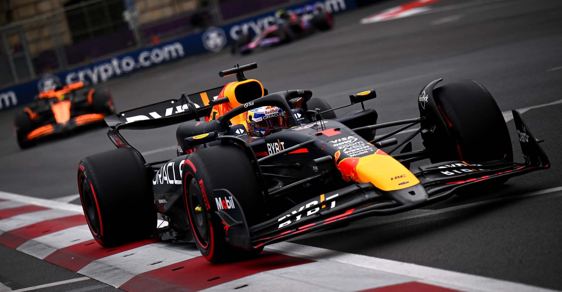 BAKU, AZERBAIJAN - SEPTEMBER 14: Max Verstappen of the Netherlands driving the (1) Oracle Red Bull Racing RB20 leads Oscar Piastri of Australia driving the (81) McLaren MCL38 Mercedes during final practice ahead of the F1 Grand Prix of Azerbaijan at Baku City Circuit on September 14, 2024 in Baku, Azerbaijan. (Photo by Dan Mullan/Getty Images)