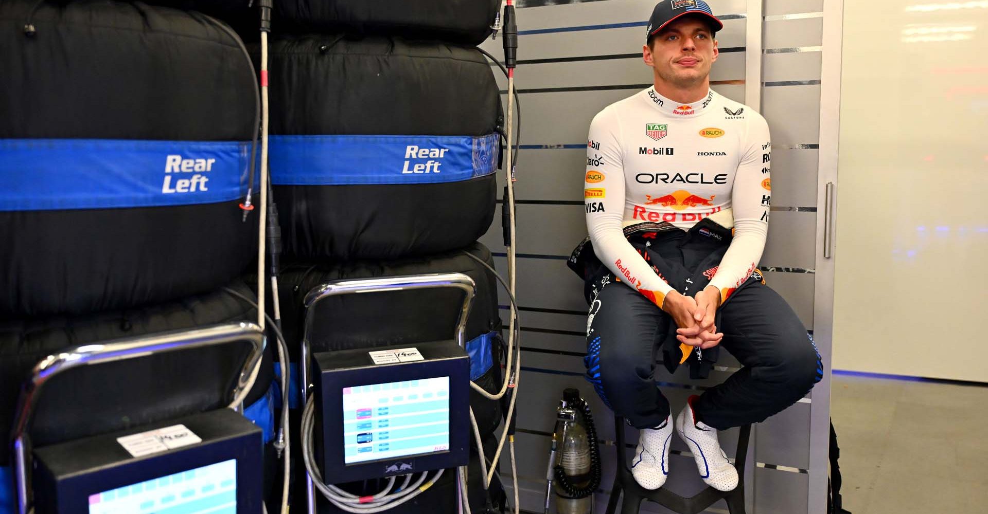 BAKU, AZERBAIJAN - SEPTEMBER 14: Max Verstappen of the Netherlands and Oracle Red Bull Racing looks on in the garage during qualifying ahead of the F1 Grand Prix of Azerbaijan at Baku City Circuit on September 14, 2024 in Baku, Azerbaijan. (Photo by Dan Mullan/Getty Images)