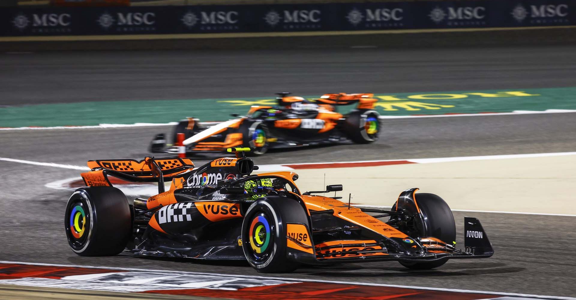 Lando Norris, McLaren MCL38, leads Oscar Piastri, McLaren MCL38