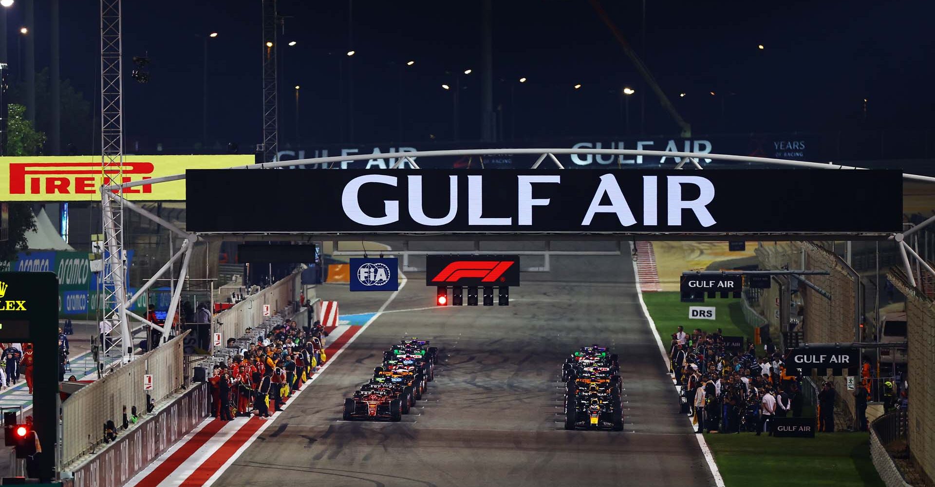 BAHRAIN, BAHRAIN - MARCH 02: Max Verstappen of the Netherlands driving the (1) Oracle Red Bull Racing RB20 and Charles Leclerc of Monaco driving the (16) Ferrari SF-24 prepare to leave the grid for the formation lap prior to the F1 Grand Prix of Bahrain at Bahrain International Circuit on March 02, 2024 in Bahrain, Bahrain. (Photo by Mark Thompson/Getty Images) // Getty Images / Red Bull Content Pool // SI202403020334 // Usage for editorial use only //