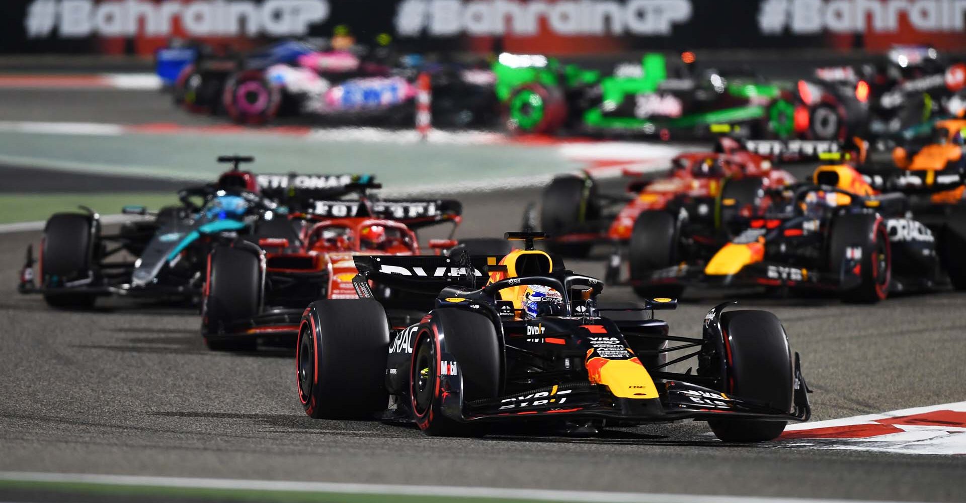 BAHRAIN, BAHRAIN - MARCH 02: Max Verstappen of the Netherlands driving the (1) Oracle Red Bull Racing RB20 leads Charles Leclerc of Monaco driving the (16) Ferrari SF-24 during the F1 Grand Prix of Bahrain at Bahrain International Circuit on March 02, 2024 in Bahrain, Bahrain. (Photo by Rudy Carezzevoli/Getty Images) // Getty Images / Red Bull Content Pool // SI202403020340 // Usage for editorial use only //