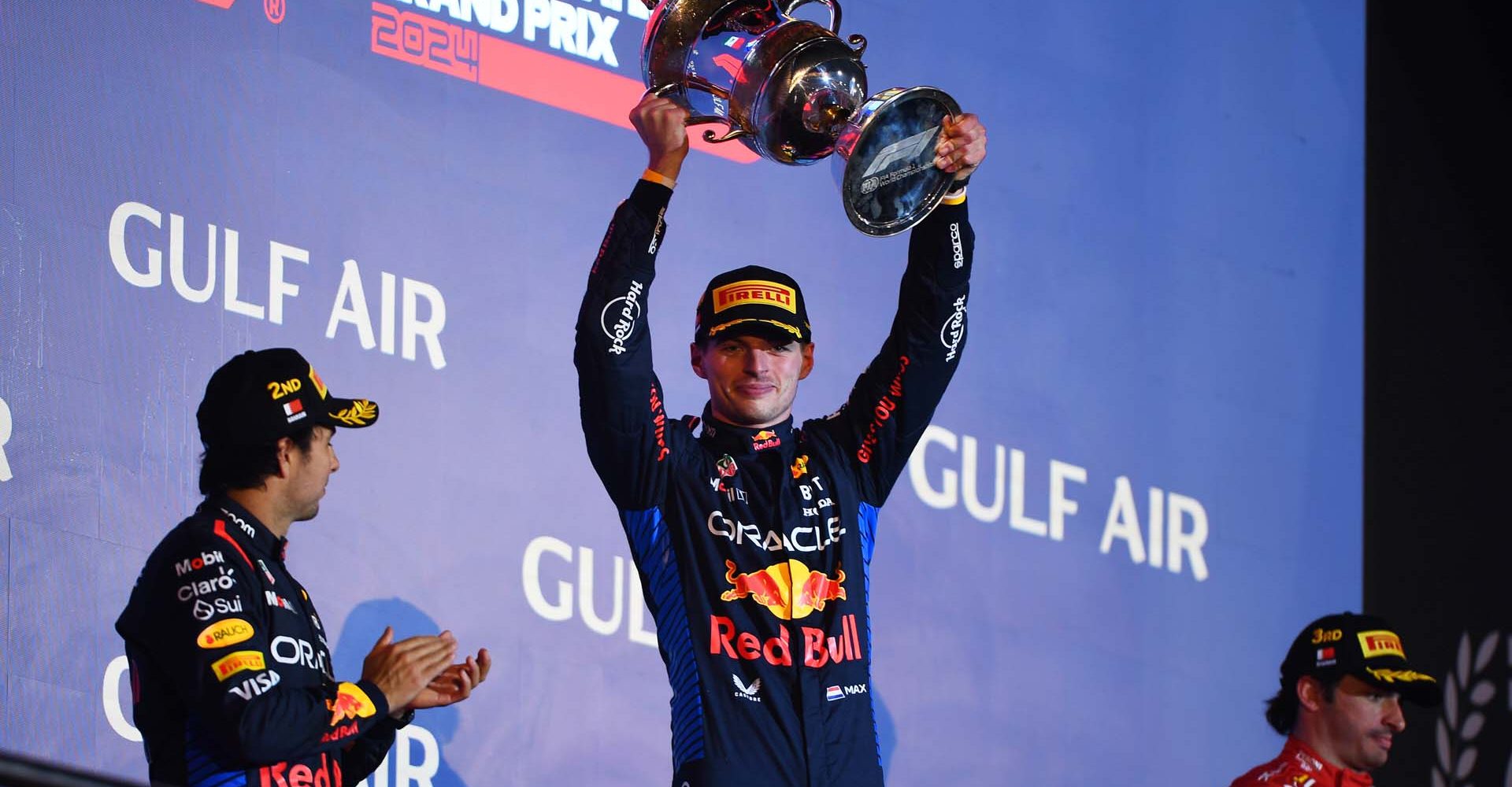 BAHRAIN, BAHRAIN - MARCH 02: Race winner Max Verstappen of the Netherlands and Oracle Red Bull Racing celebrates on the podium during the F1 Grand Prix of Bahrain at Bahrain International Circuit on March 02, 2024 in Bahrain, Bahrain. (Photo by Rudy Carezzevoli/Getty Images) // Getty Images / Red Bull Content Pool // SI202403020521 // Usage for editorial use only //