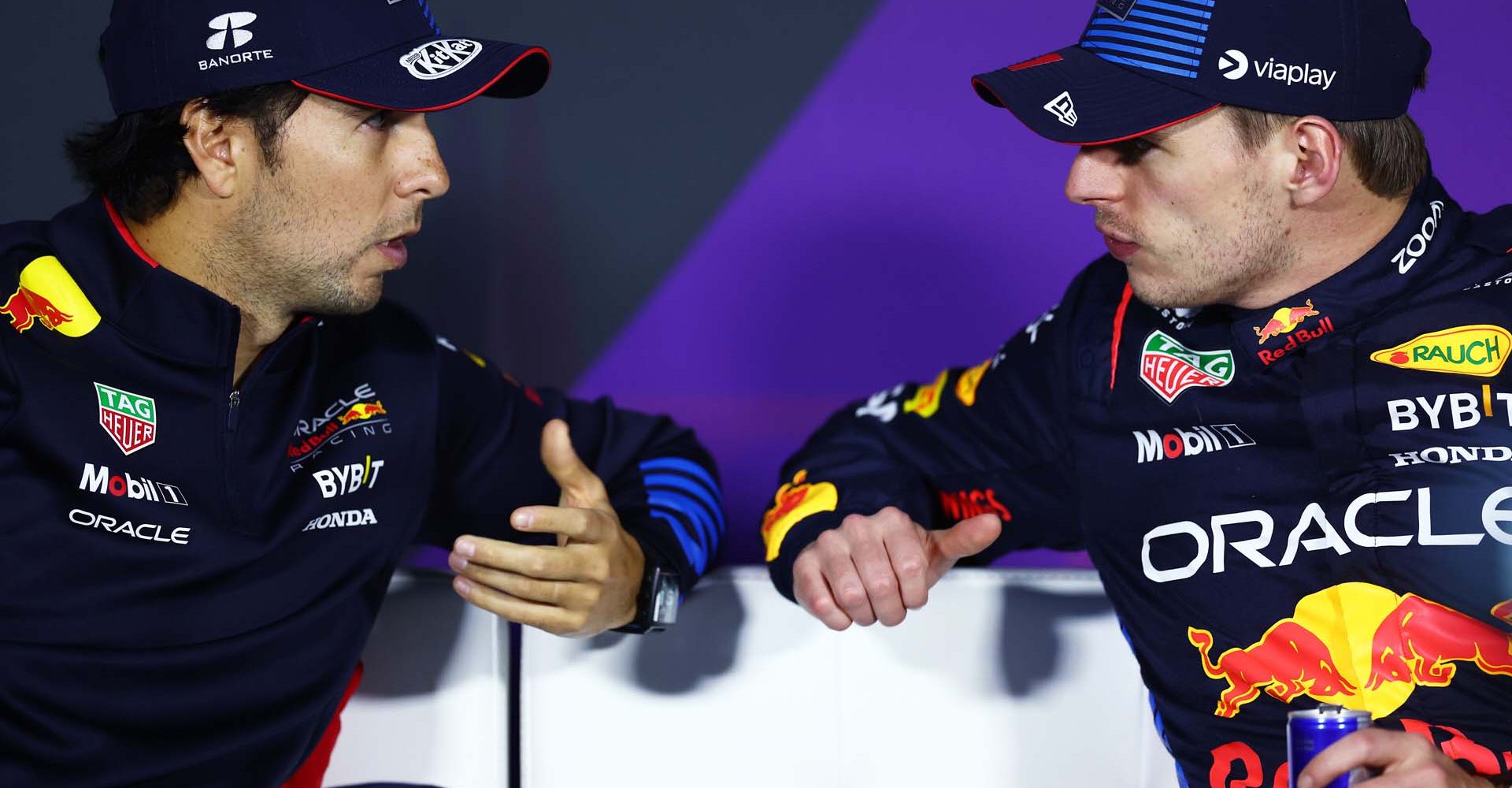 BAHRAIN, BAHRAIN - MARCH 02: Race winner Max Verstappen of the Netherlands and Oracle Red Bull Racing talks with Second placed Sergio Perez of Mexico and Oracle Red Bull Racing as they attend a press conference after the F1 Grand Prix of Bahrain at Bahrain International Circuit on March 02, 2024 in Bahrain, Bahrain. (Photo by Bryn Lennon/Getty Images) // Getty Images / Red Bull Content Pool // SI202403020545 // Usage for editorial use only //