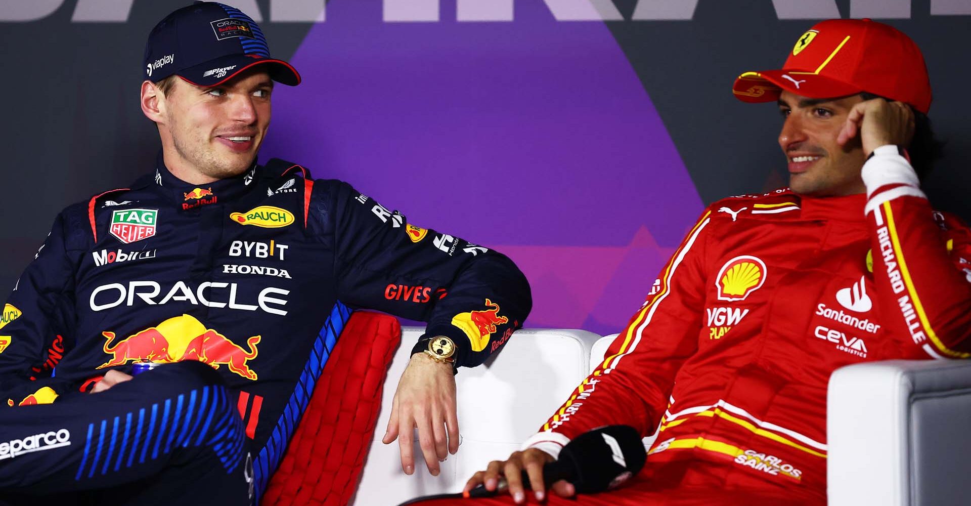 BAHRAIN, BAHRAIN - MARCH 02: Race winner Max Verstappen of the Netherlands and Oracle Red Bull Racing and Third placed Carlos Sainz of Spain and Ferrari talk in a press conference the F1 Grand Prix of Bahrain at Bahrain International Circuit on March 02, 2024 in Bahrain, Bahrain. (Photo by Bryn Lennon/Getty Images) // Getty Images / Red Bull Content Pool // SI202403020548 // Usage for editorial use only //