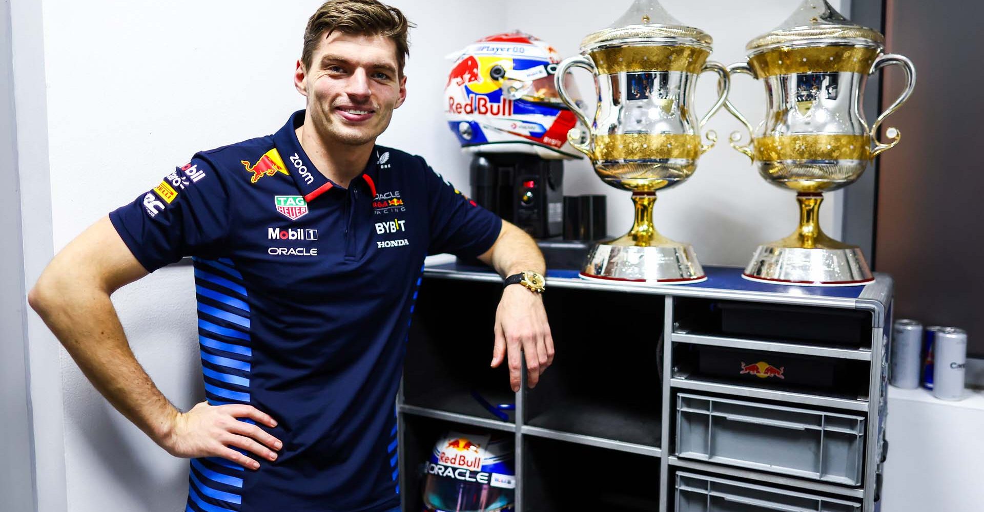 BAHRAIN, BAHRAIN - MARCH 02: Race winner Max Verstappen of the Netherlands and Oracle Red Bull Racing poses for a photo with the drivers and constructors race win trophies after the F1 Grand Prix of Bahrain at Bahrain International Circuit on March 02, 2024 in Bahrain, Bahrain. (Photo by Mark Thompson/Getty Images) // Getty Images / Red Bull Content Pool // SI202403020647 // Usage for editorial use only //