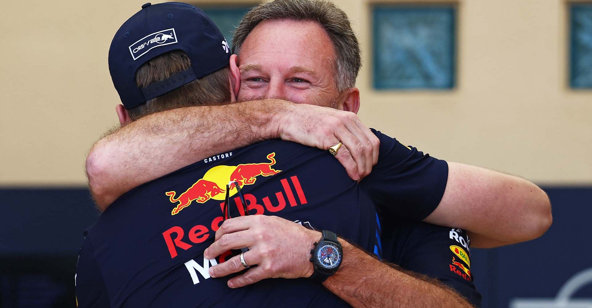 BAHRAIN, BAHRAIN - FEBRUARY 29: Max Verstappen of the Netherlands and Oracle Red Bull Racing and Oracle Red Bull Racing Team Principal Christian Horner embrace in the Paddock prior to practice ahead of the F1 Grand Prix of Bahrain at Bahrain International Circuit on February 29, 2024 in Bahrain, Bahrain. (Photo by Clive Rose/Getty Images) // Getty Images / Red Bull Content Pool // SI202402290283 // Usage for editorial use only //