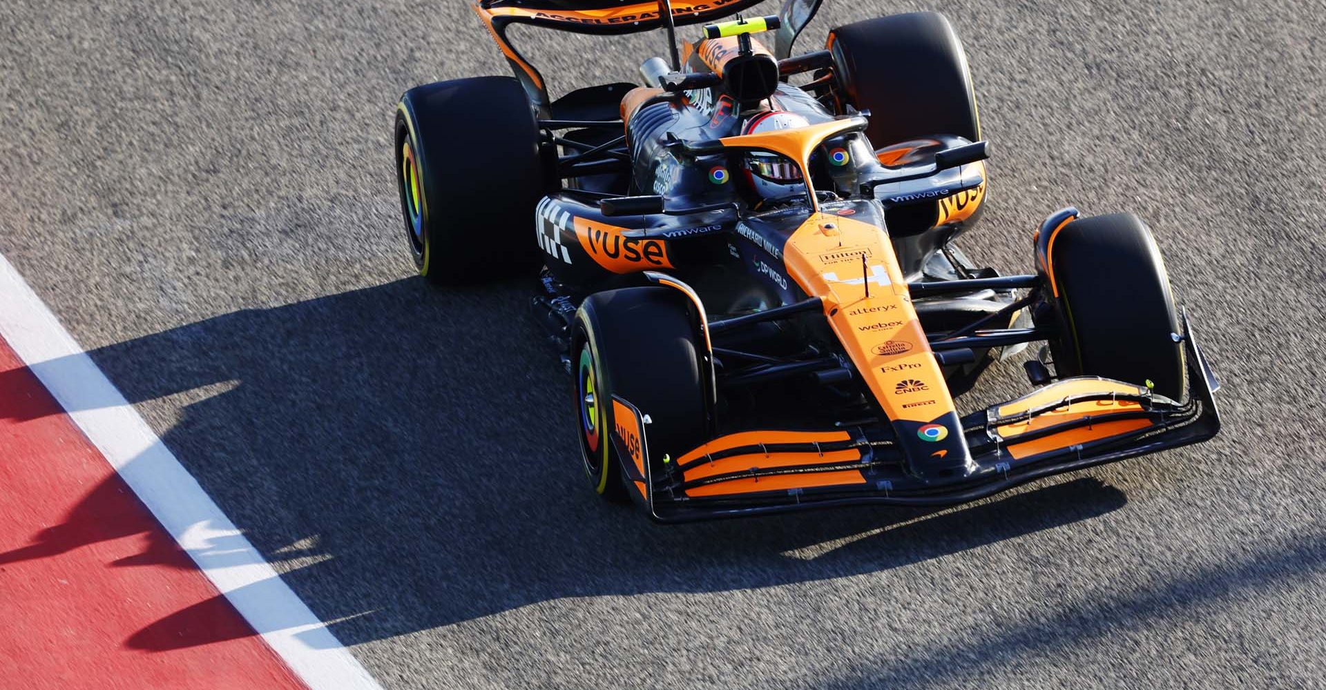 Lando Norris, McLaren MCL38, in the pit lane