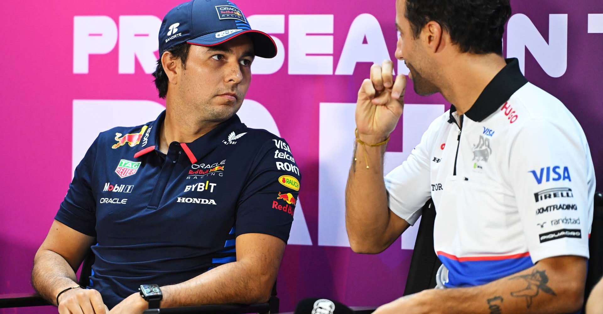 BAHRAIN, BAHRAIN - FEBRUARY 21: Sergio Perez of Mexico and Oracle Red Bull Racing and Daniel Ricciardo of Australia and Visa Cash App RB attend the Drivers Press Conference during day one of F1 Testing at Bahrain International Circuit on February 21, 2024 in Bahrain, Bahrain. (Photo by Rudy Carezzevoli/Getty Images) // Getty Images / Red Bull Content Pool // SI202402210987 // Usage for editorial use only //